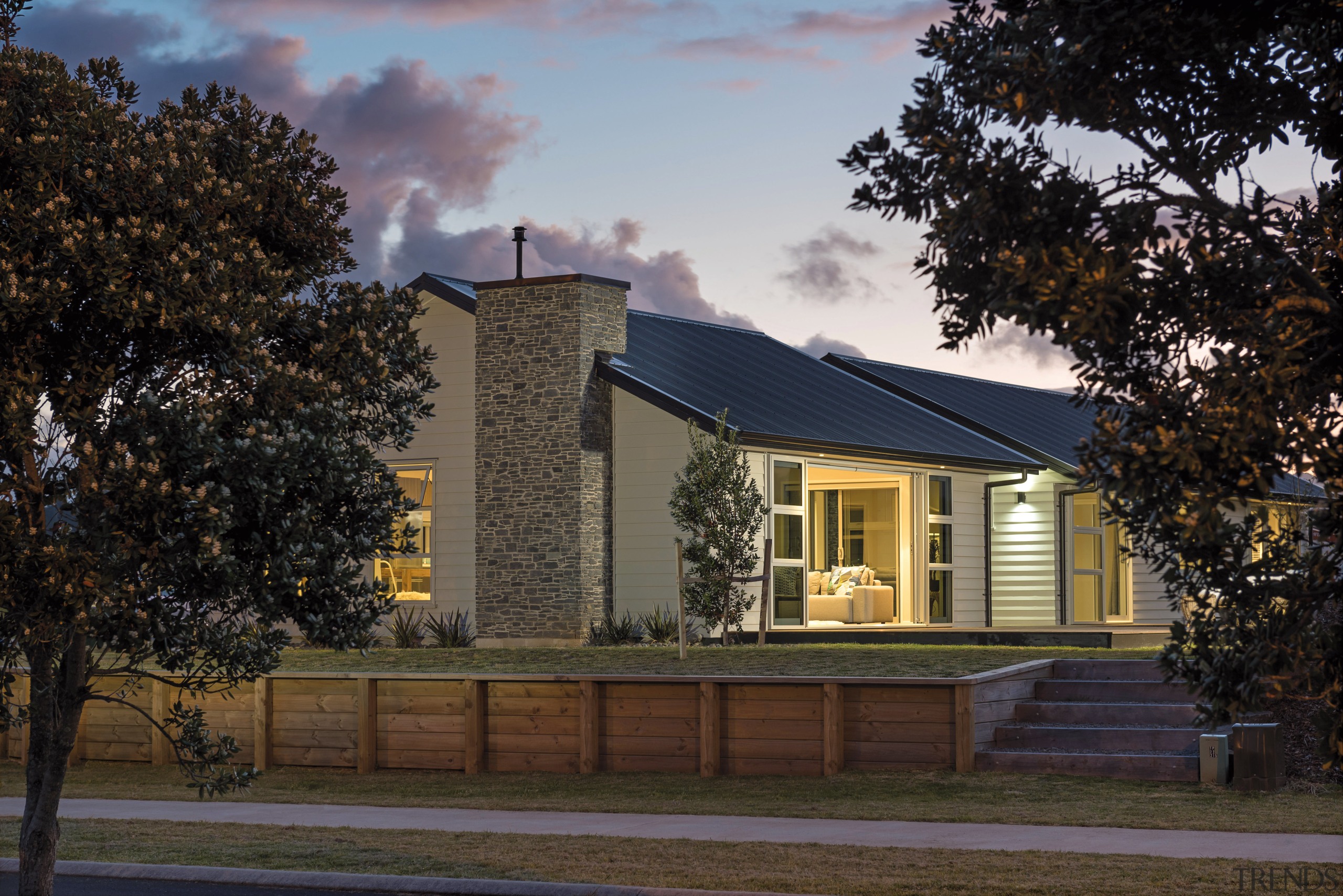 On this GJ Gardner home, James Hardie weatherboard architecture, building, cottage, estate, evening, facade, farmhouse, home, house, property, real estate, residential area, roof, siding, sky, suburb, tree, black