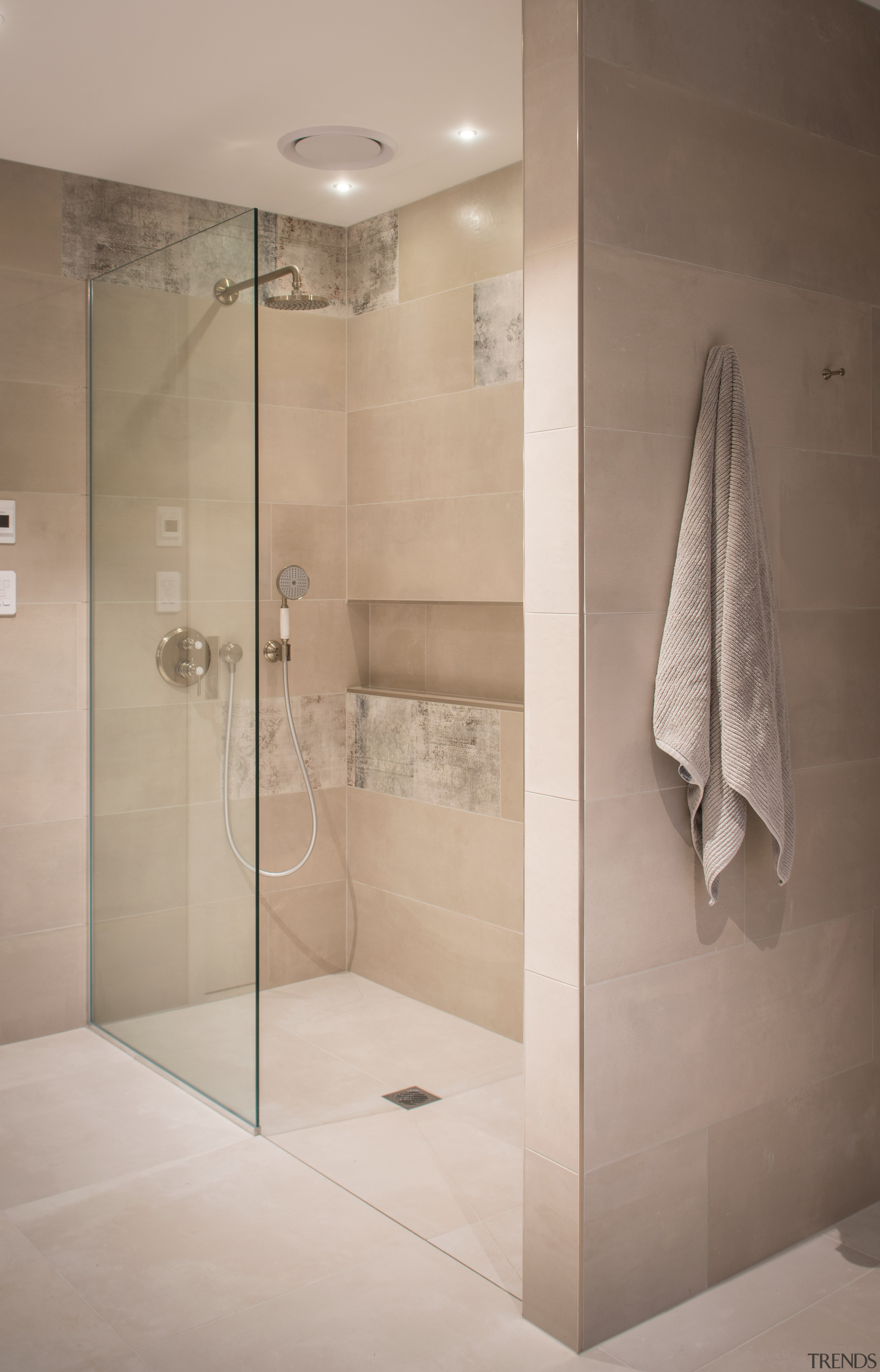 ​​​​​​​This shower – behind the door as you 