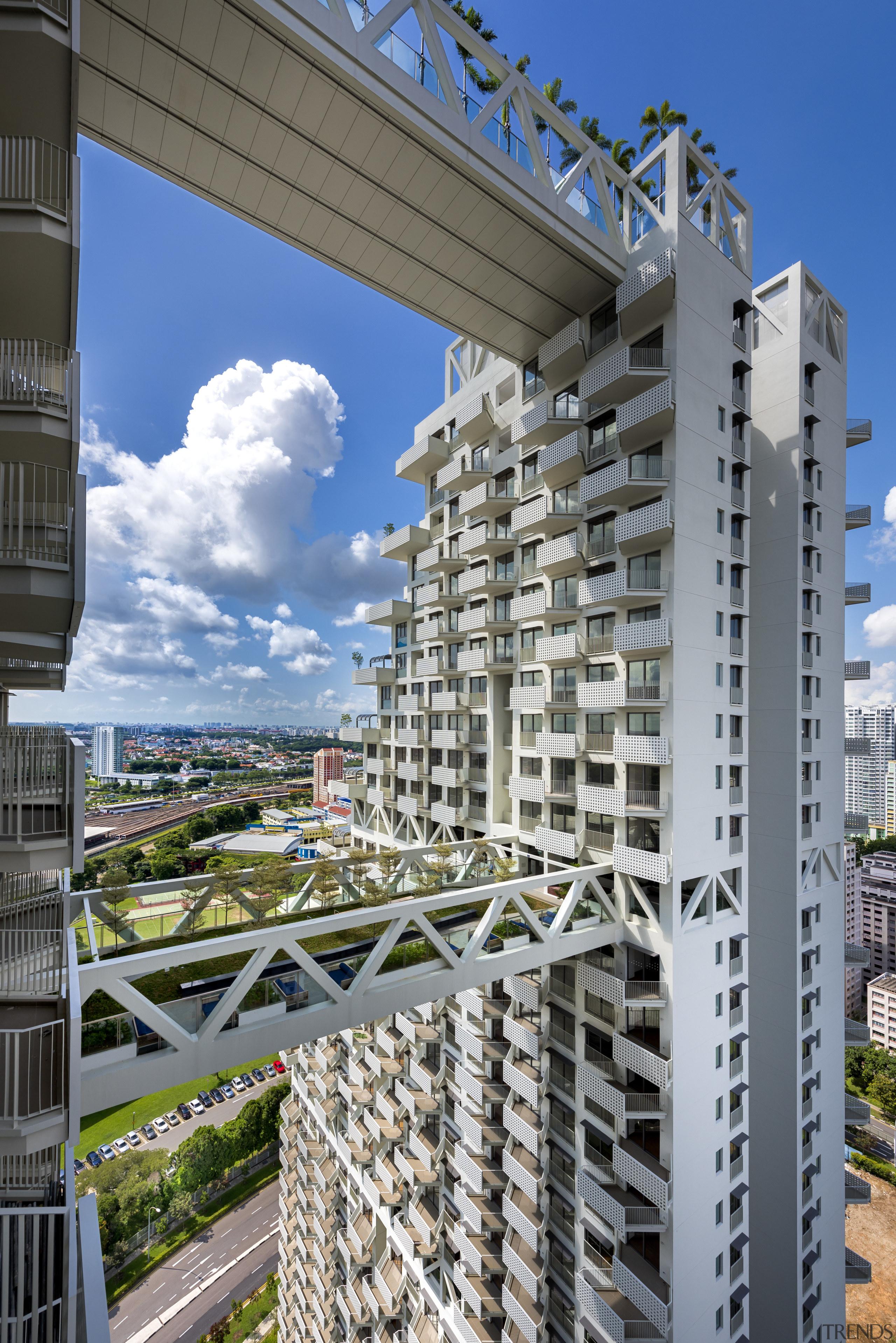 Sky Habitats two towers are positioned as far apartment, architecture, building, city, commercial building, condominium, corporate headquarters, daytime, facade, landmark, metropolis, metropolitan area, mixed use, real estate, residential area, sky, skyscraper, structure, tower block, urban area, gray