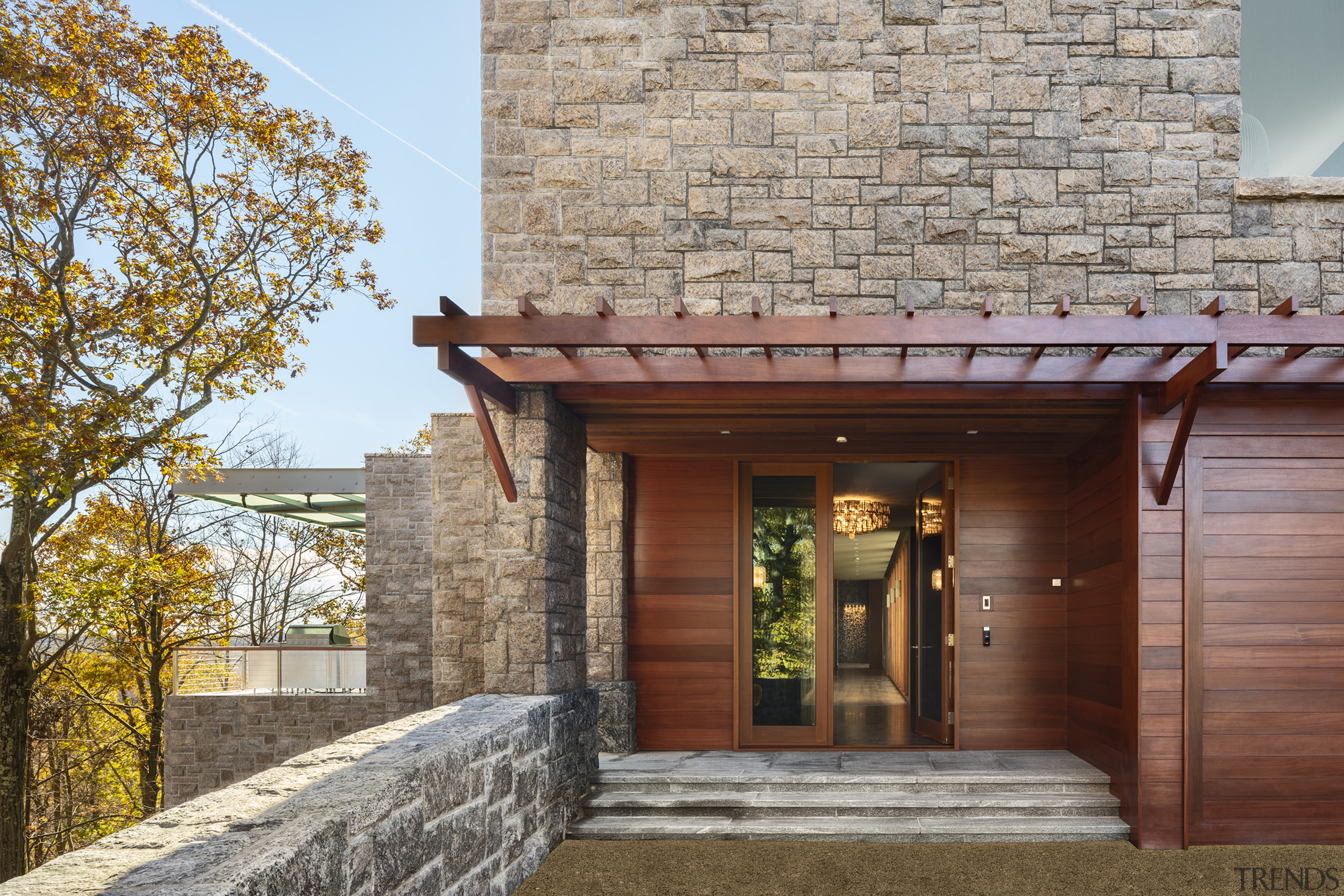 Entry to the contemporary yet naturally clad home 