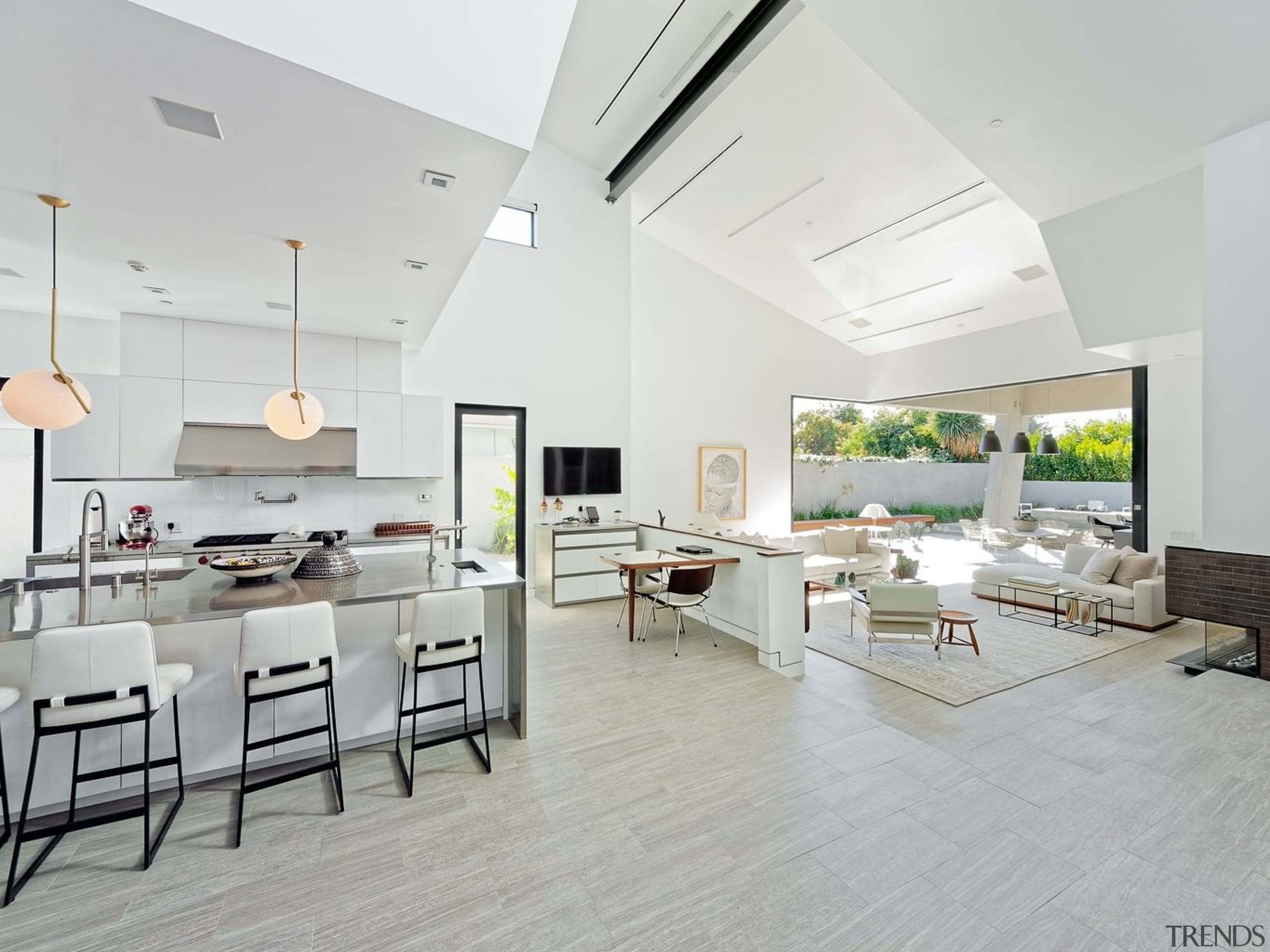 The kitchen flows out through the lounge and ceiling, floor, flooring, house, interior design, living room, real estate, gray