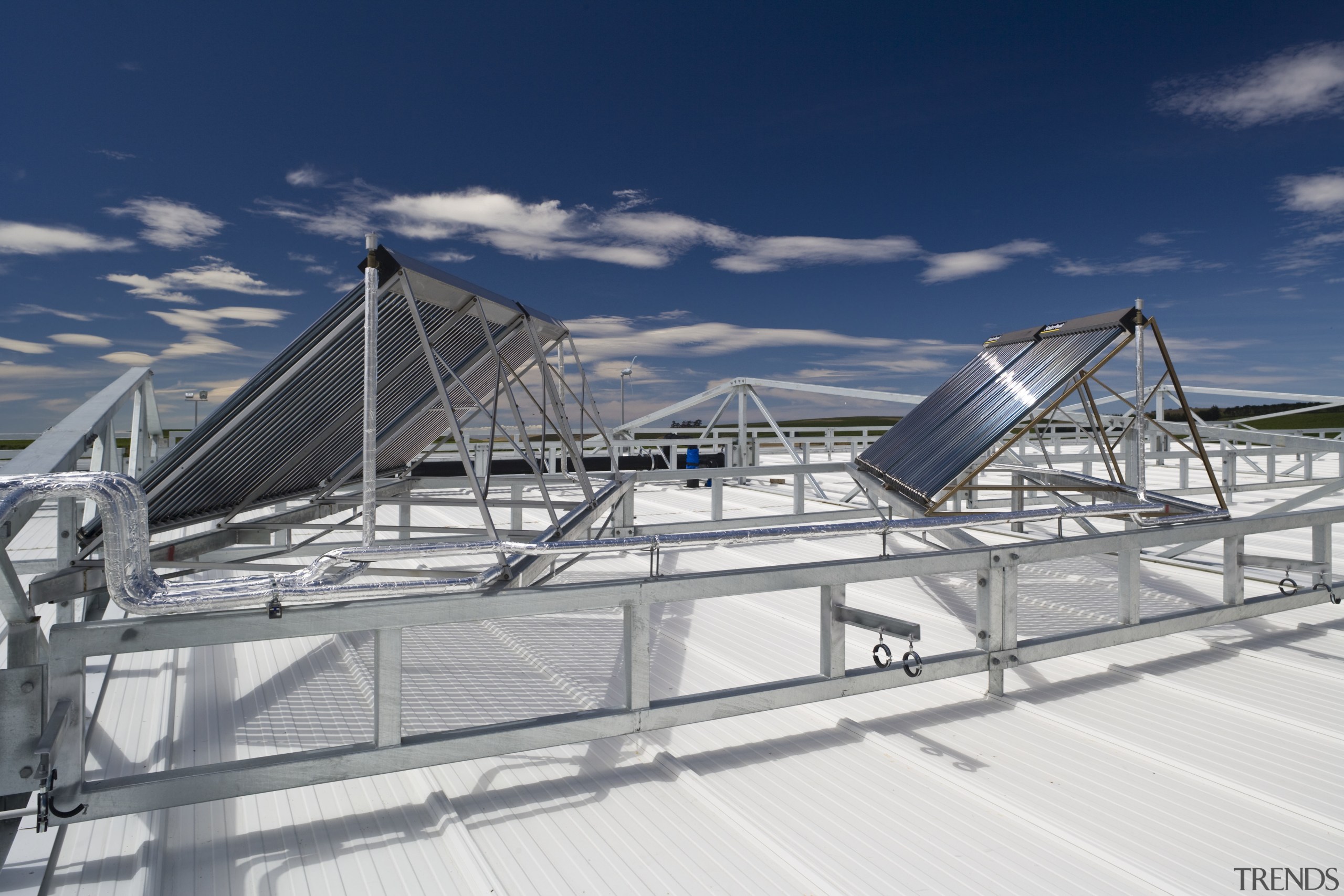View of vacuum tubes which use sunlight to architecture, daylighting, fixed link, roof, sky, steel, structure, water, blue, gray
