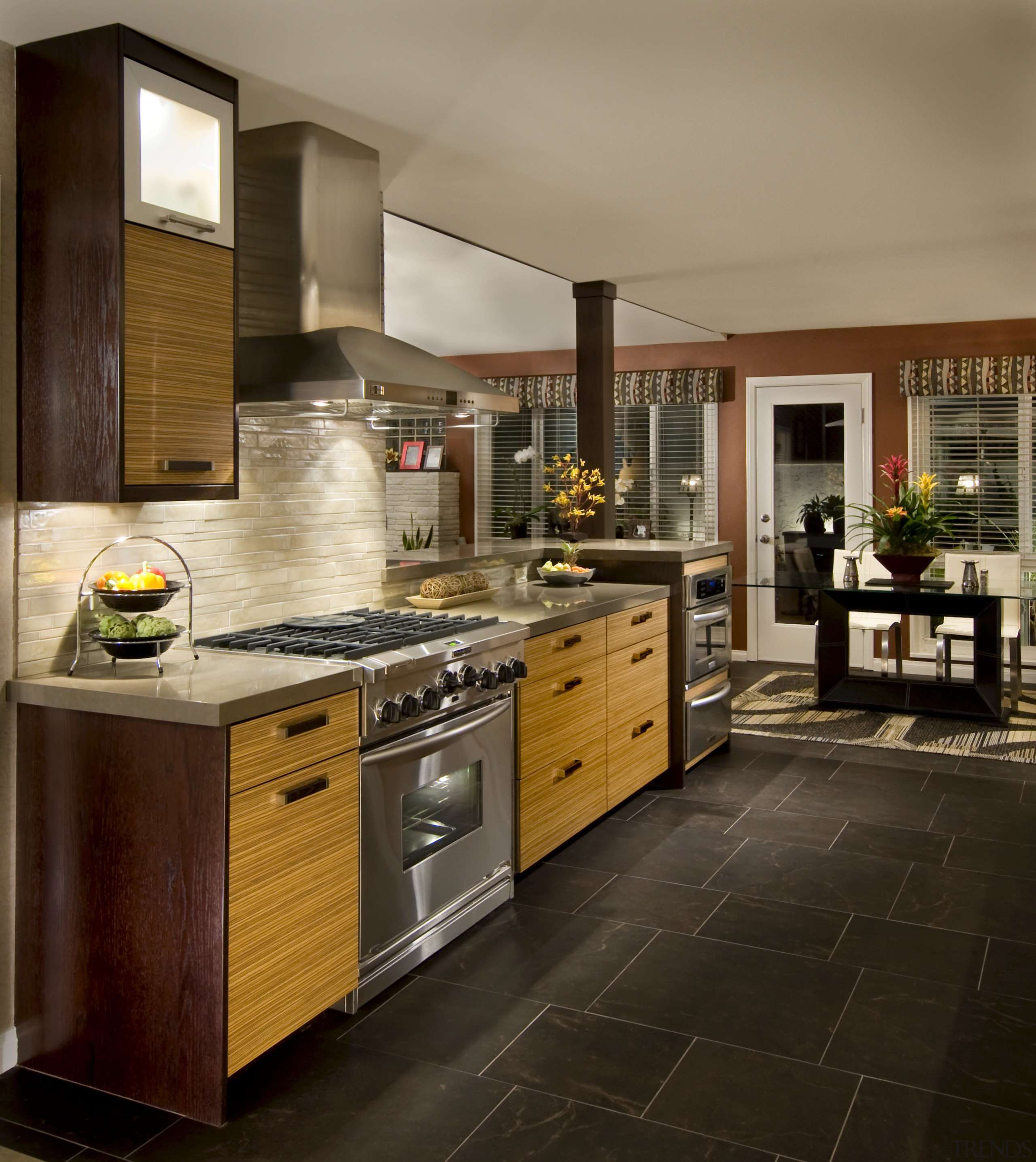 Designed by Kitchen Places, this kitchen design uses cabinetry, countertop, cuisine classique, home appliance, interior design, kitchen, room, brown