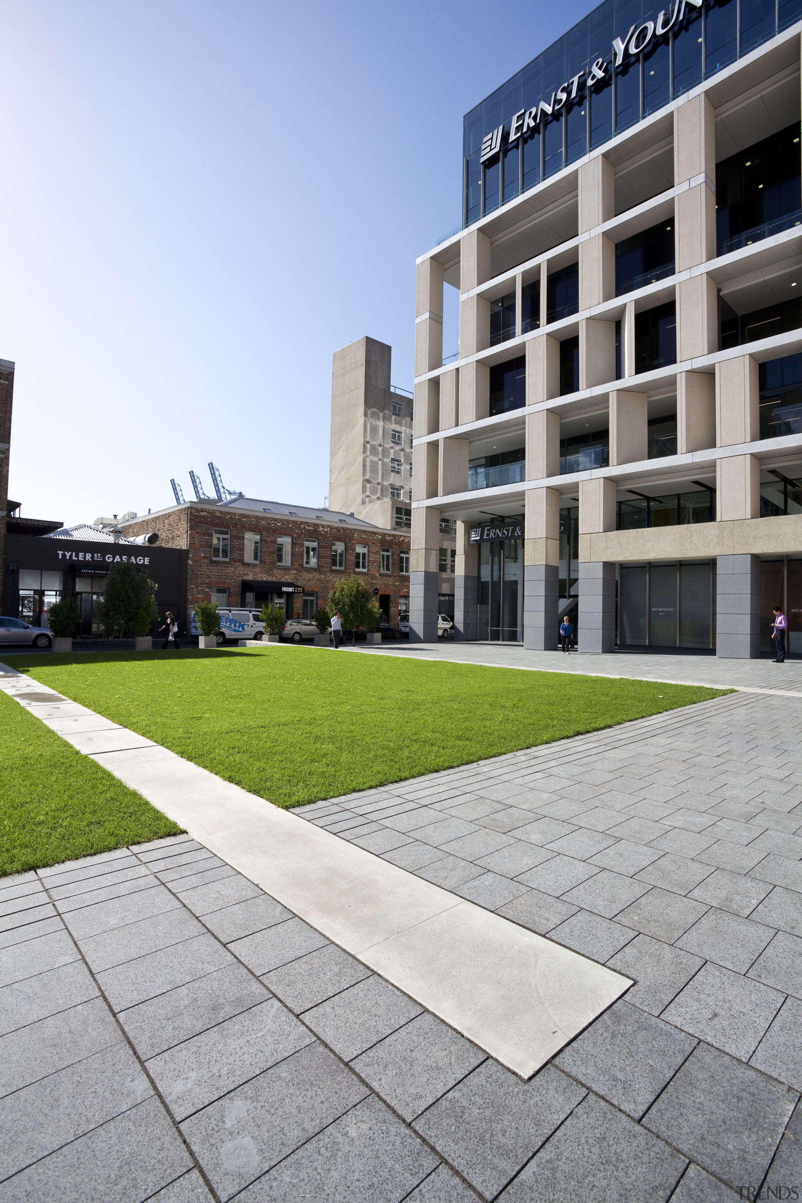 View of the public square at the Britomart apartment, architecture, building, campus, condominium, corporate headquarters, daytime, estate, facade, grass, house, mixed use, neighbourhood, real estate, residential area, sky, urban design, gray, white