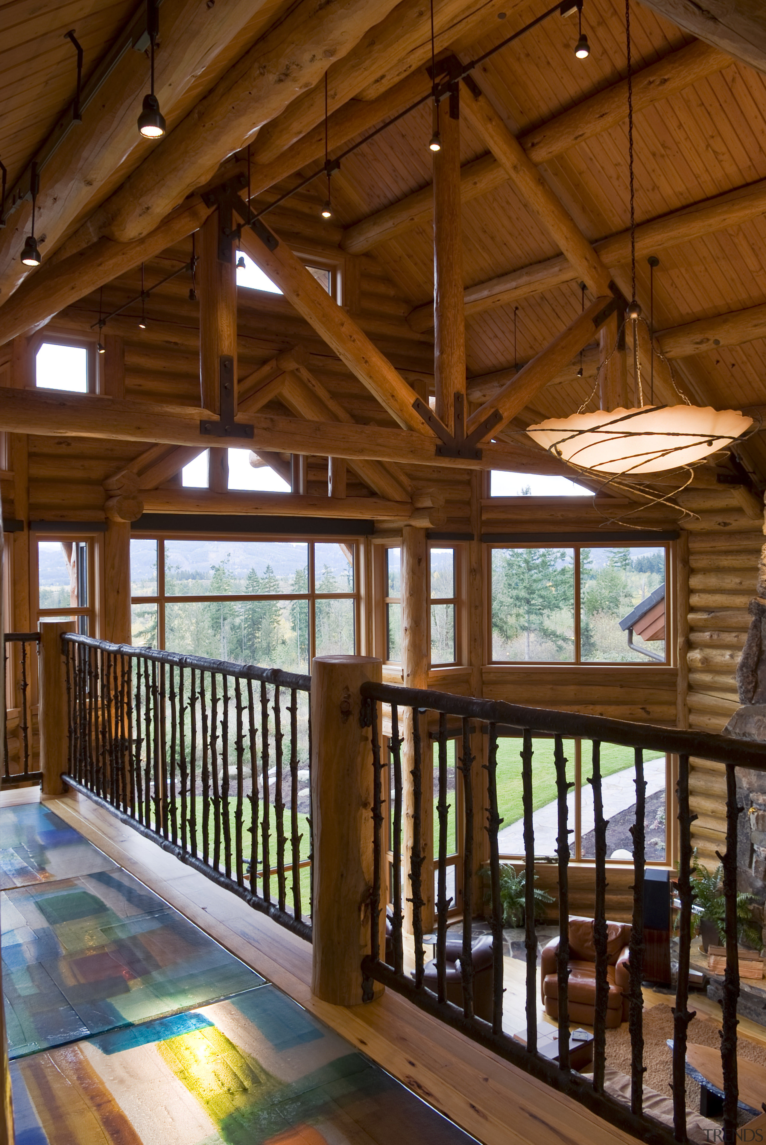 Image of the interior of this home which beam, daylighting, estate, home, house, interior design, log cabin, porch, real estate, window, wood, brown
