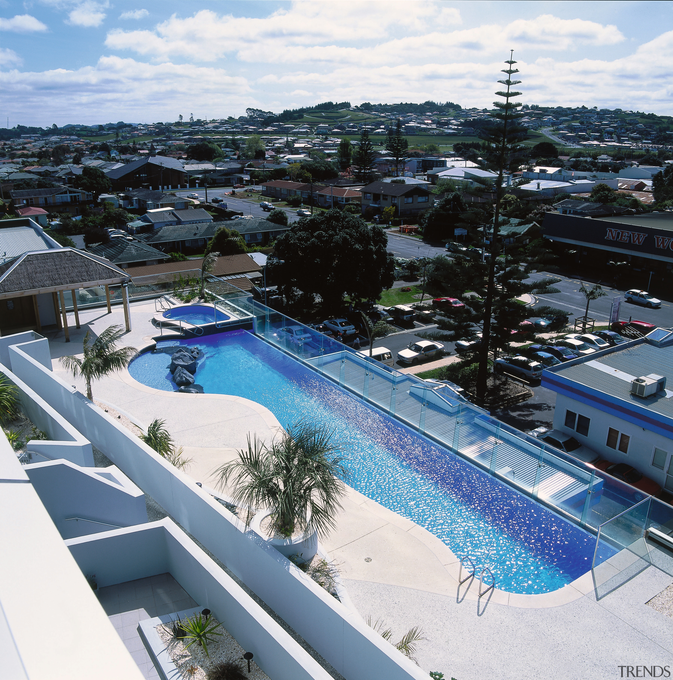 View of apartment swimming pool and spa with leisure, property, real estate, resort, swimming pool, water, white, black