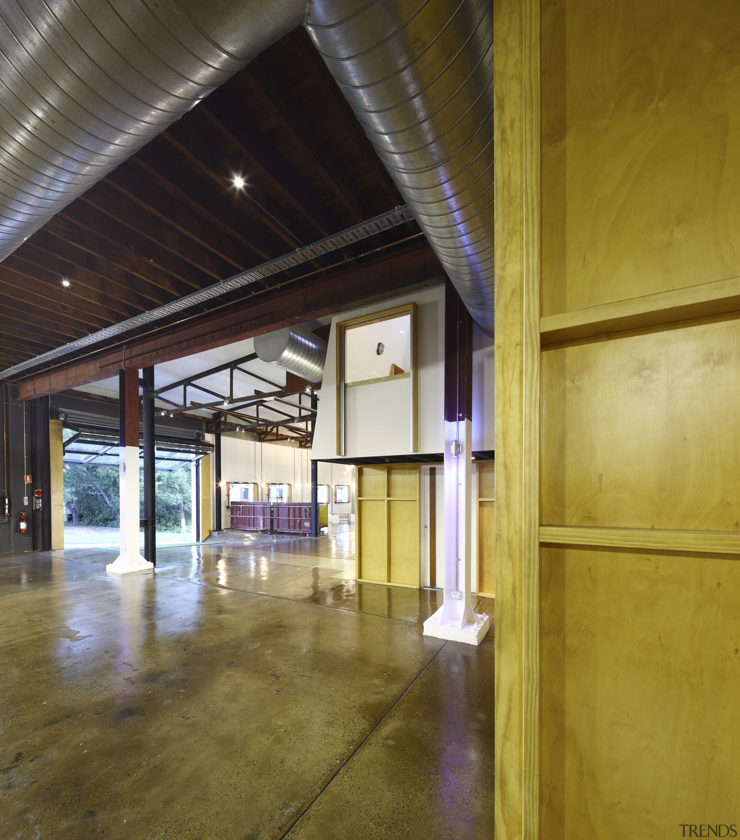 View of the bar on the lower level architecture, ceiling, daylighting, floor, flooring, interior design, lobby, structure, brown