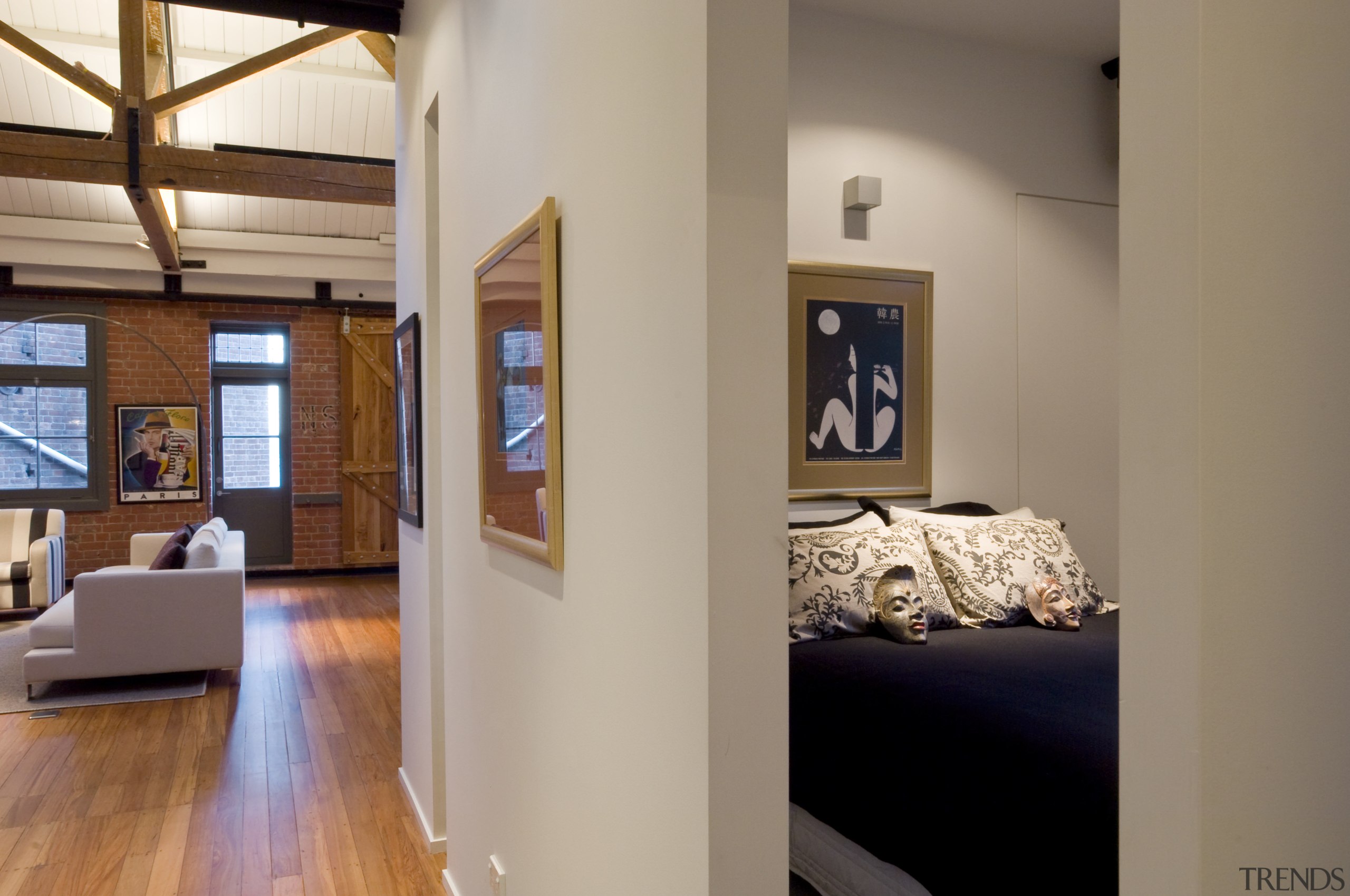 View of the guest bedroom. - View of exhibition, floor, flooring, interior design, loft, room, wood, brown, gray