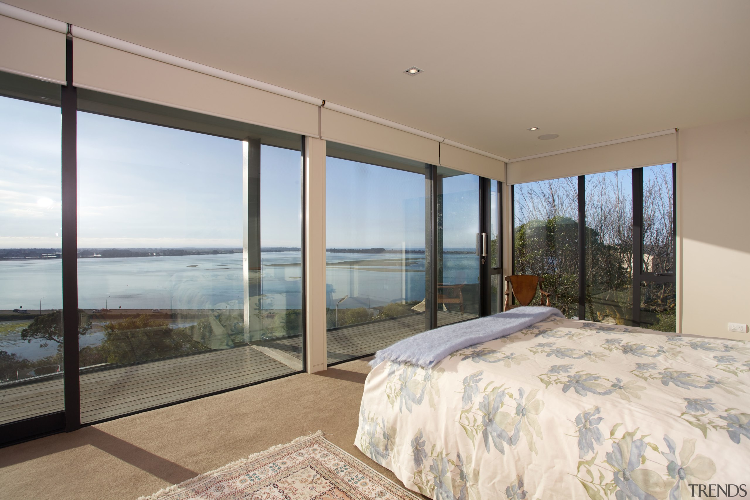 Contemporary master bedroom with sea views - Contemporary architecture, bedroom, condominium, door, estate, home, house, interior design, property, real estate, room, window, gray