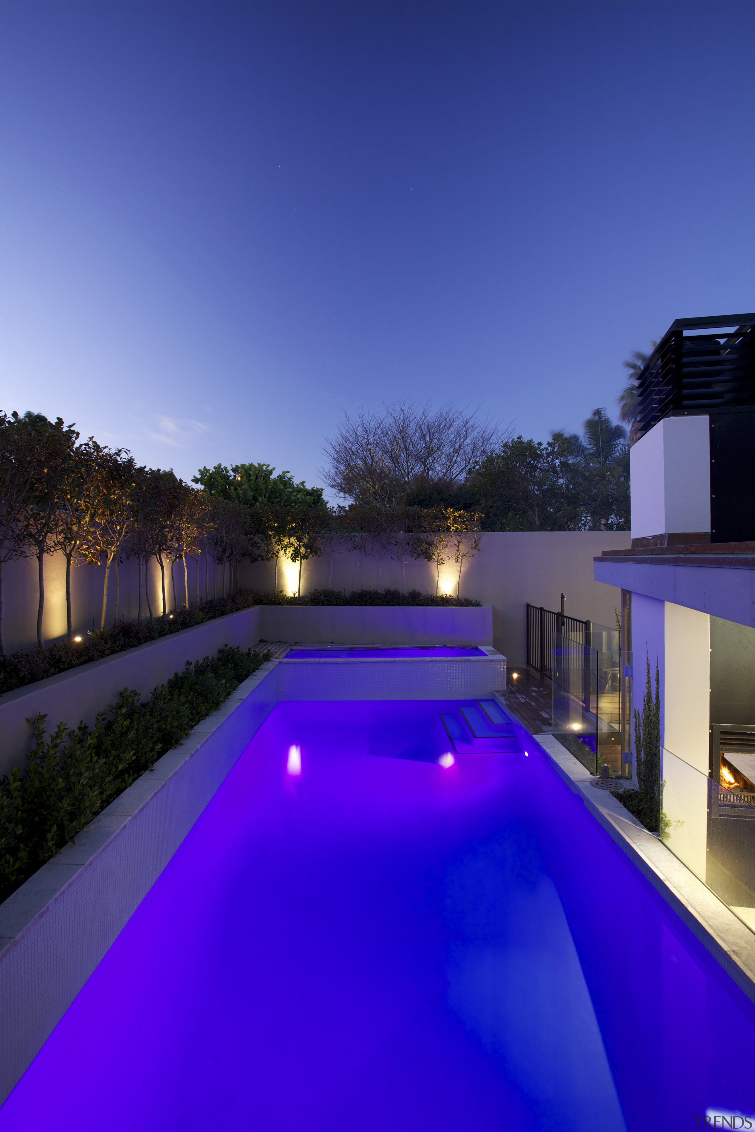 Landscape designer Fiona Kelly converted a walkway into architecture, estate, home, house, landscape lighting, leisure, light, lighting, property, real estate, reflection, residential area, sky, swimming pool, villa, water, blue