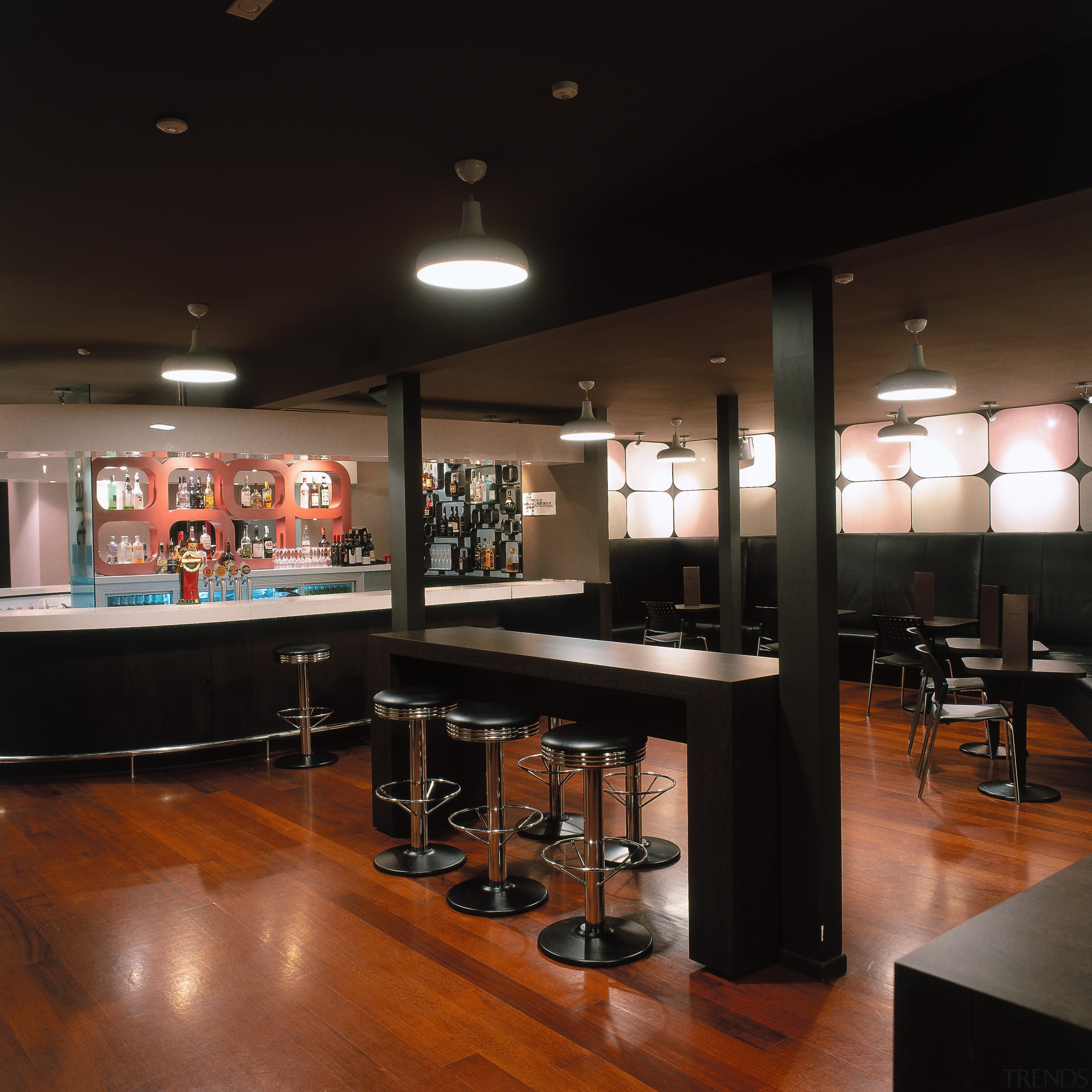 Bar interior with extensive wooden flooring shown - bar, furniture, interior design, restaurant, table, black