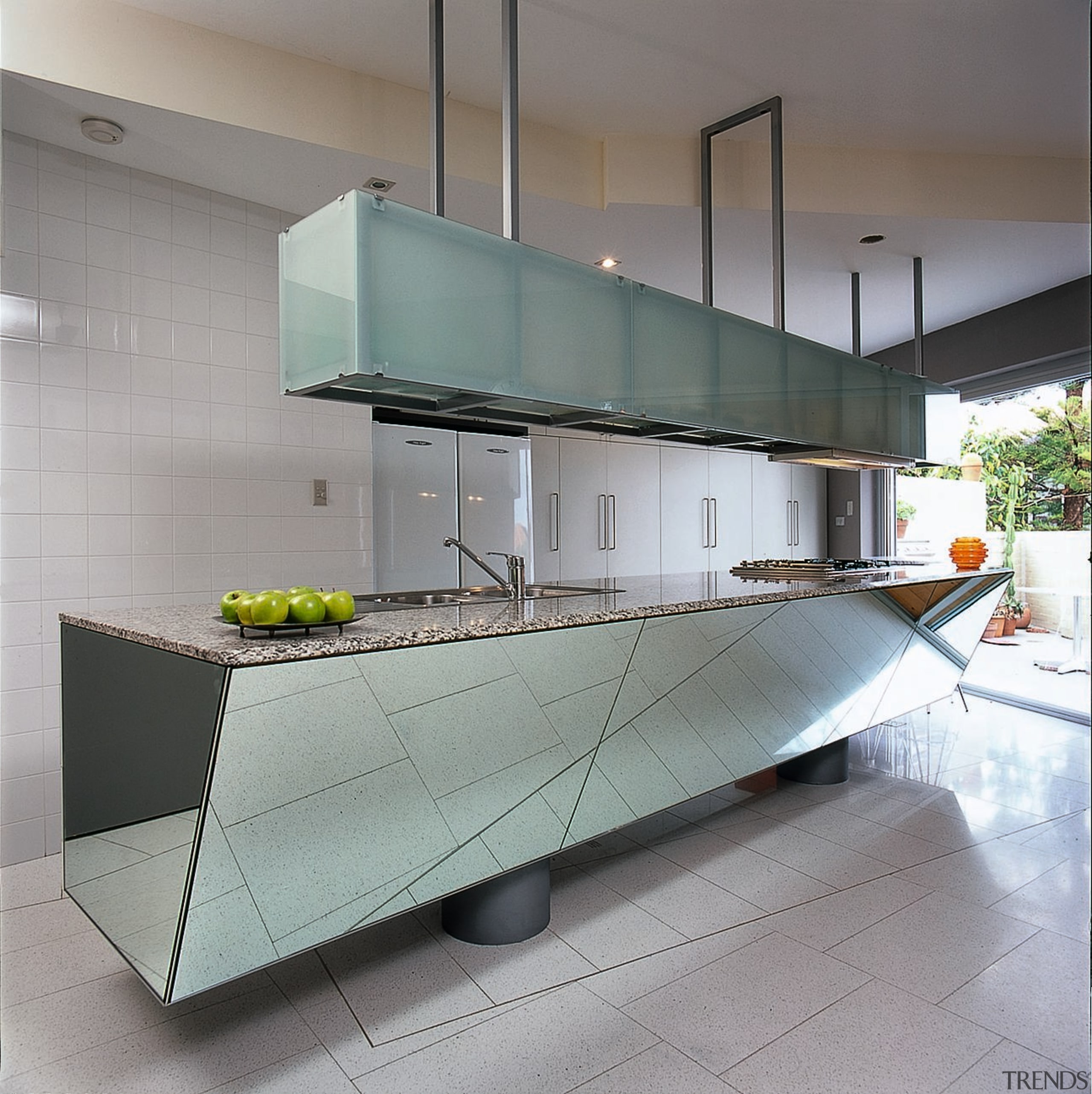 Rhomboid-shaped, mirror-clad island in this kitchen architecture, countertop, interior design, kitchen, product design, gray