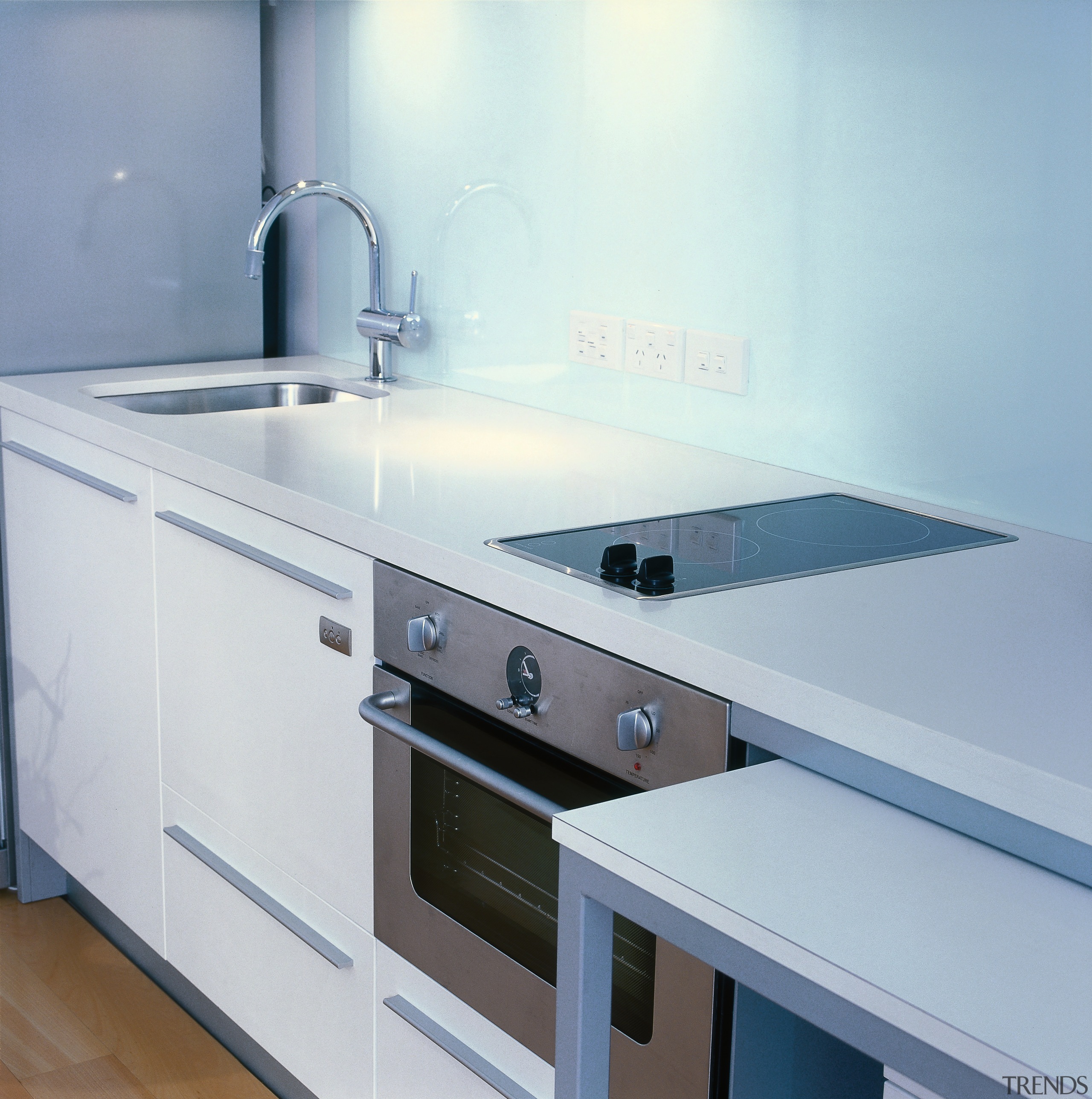 Kitchen with white benchtop and cabinetry, stainless steel bathroom sink, countertop, kitchen, product, product design, sink, tap, gray