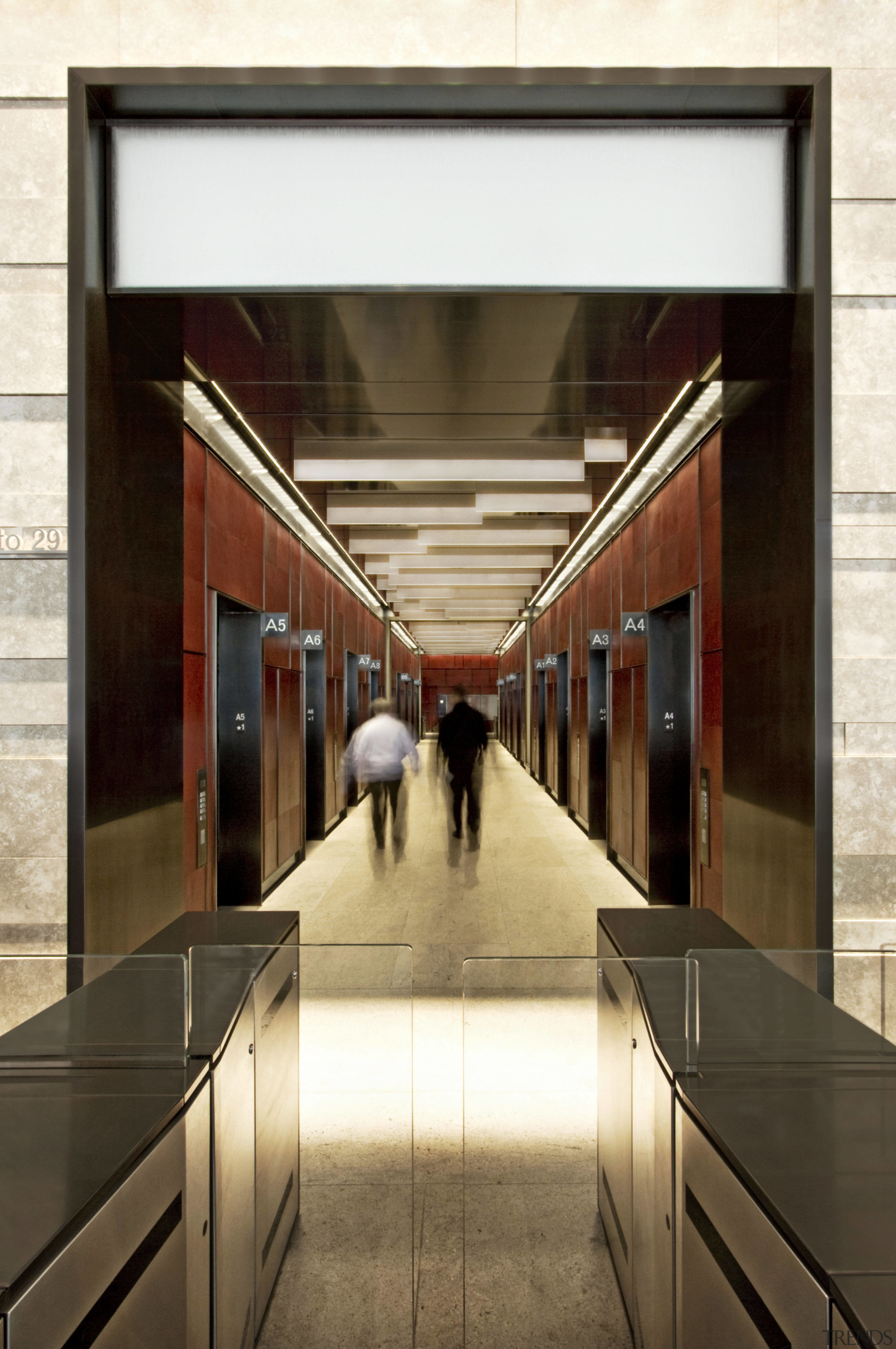 Interior view of the elevator lobby at the architecture, brown, white