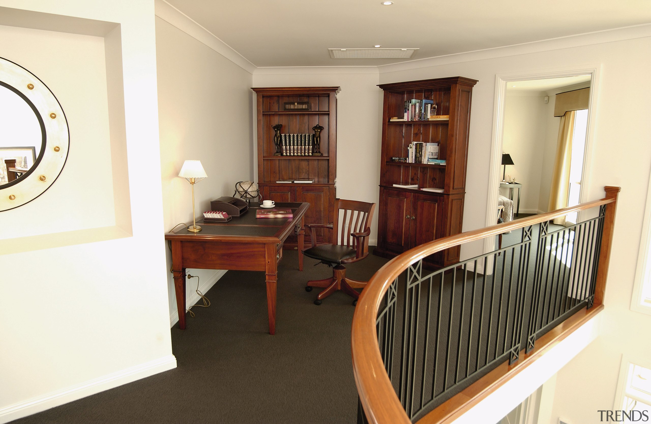 A view of the study area, brown carpet, floor, flooring, home, interior design, property, real estate, room, orange