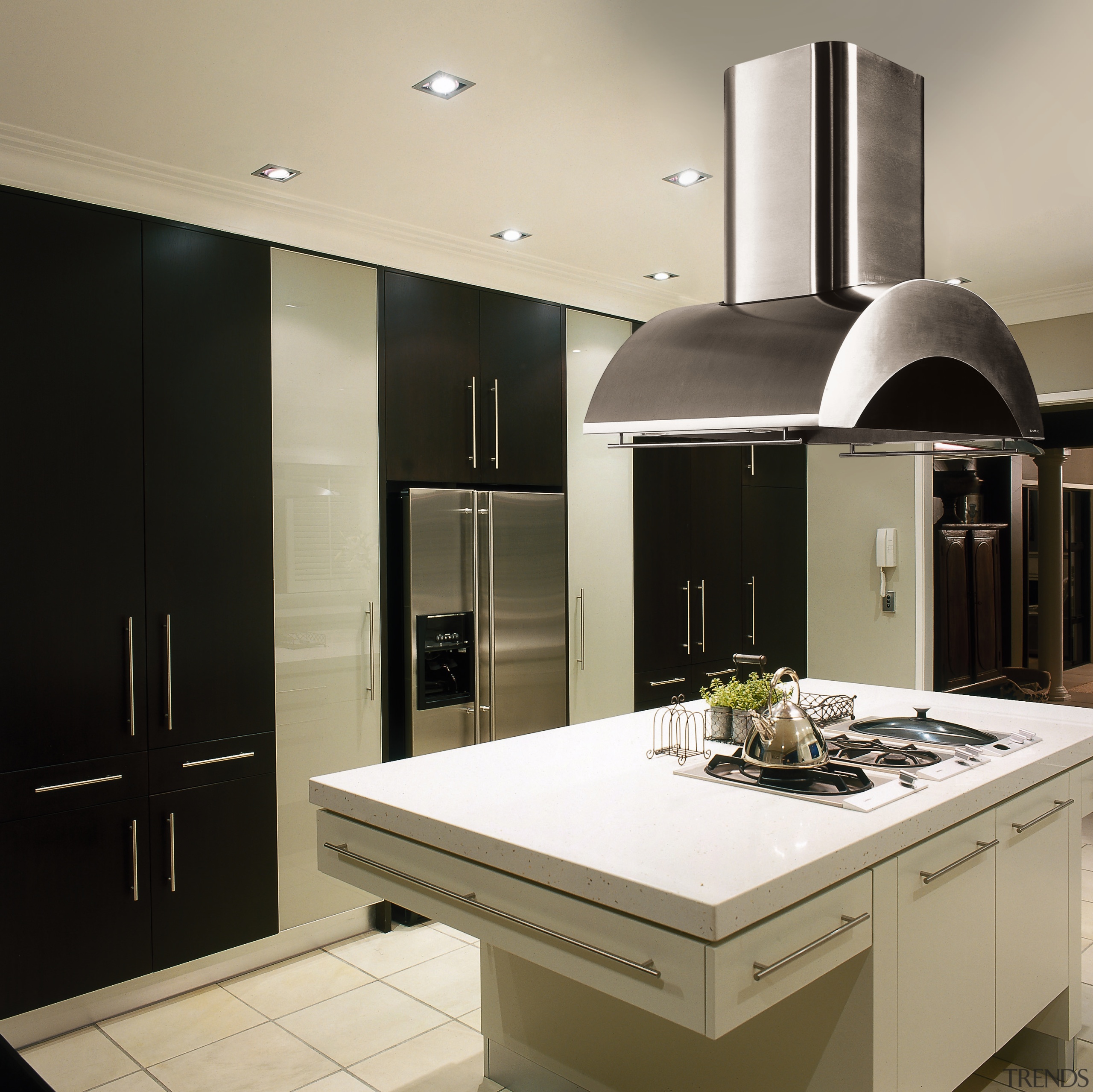 Kitchen with black and white cabinetry, white island countertop, home appliance, interior design, kitchen, gray, black