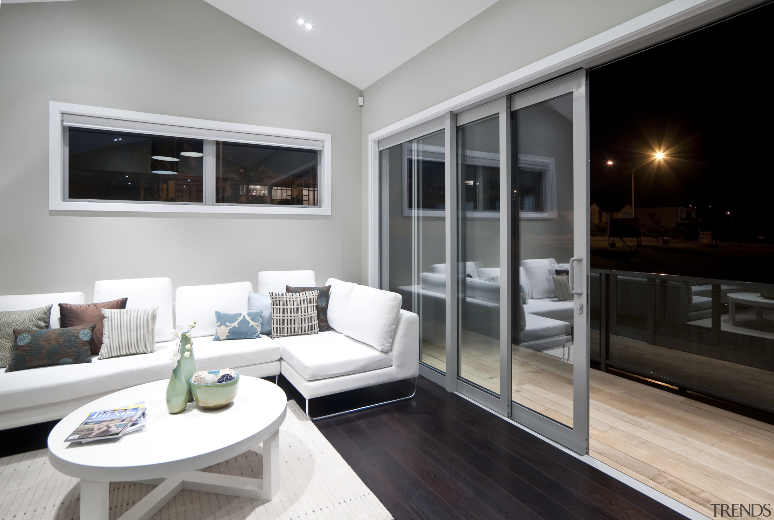 View of the main living area of this interior design, living room, real estate, window, gray, black, white