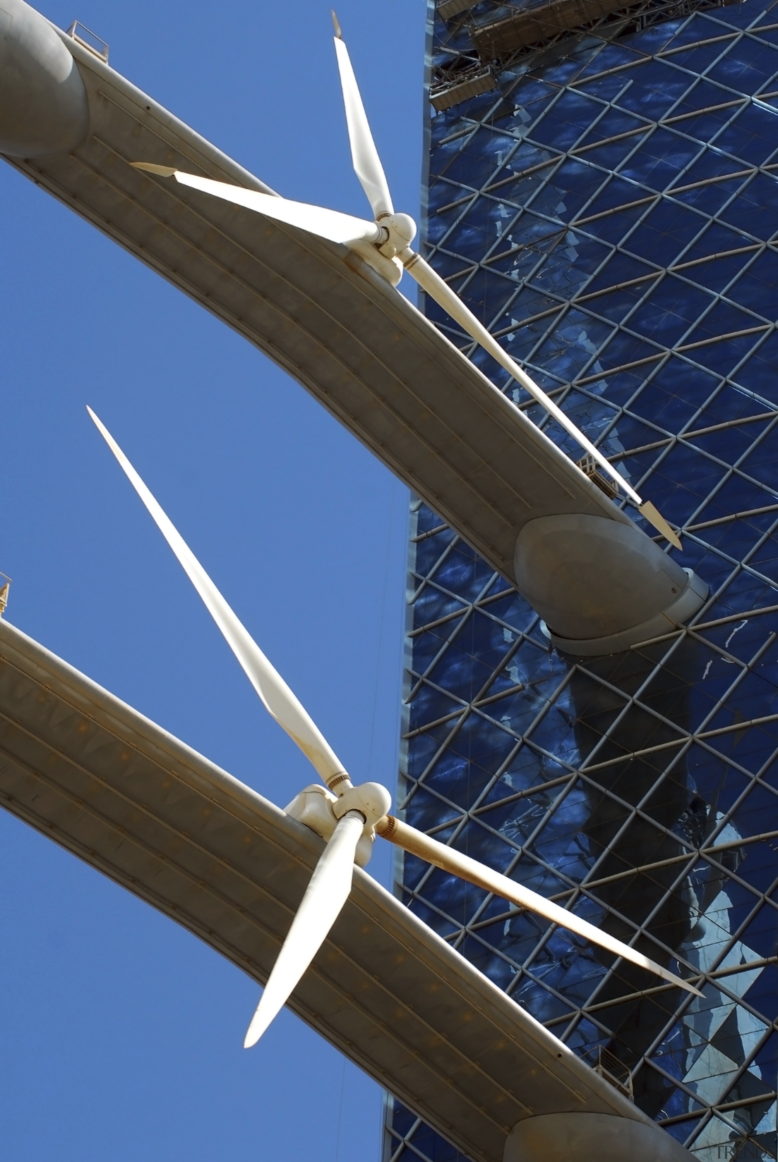 The new Bahrain world Trade Centre meets up energy, fixed link, line, sky, wind, windmill, blue, black