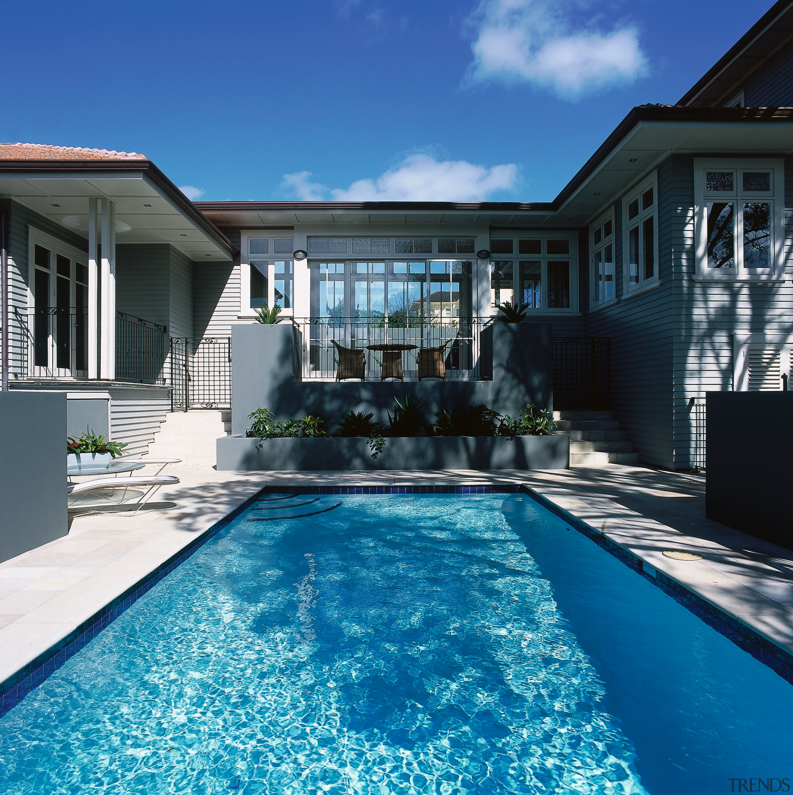 Pool area of weatherboard house with boxed gardens backyard, estate, facade, home, house, mansion, property, real estate, residential area, resort, resort town, swimming pool, villa, water, window, blue, black