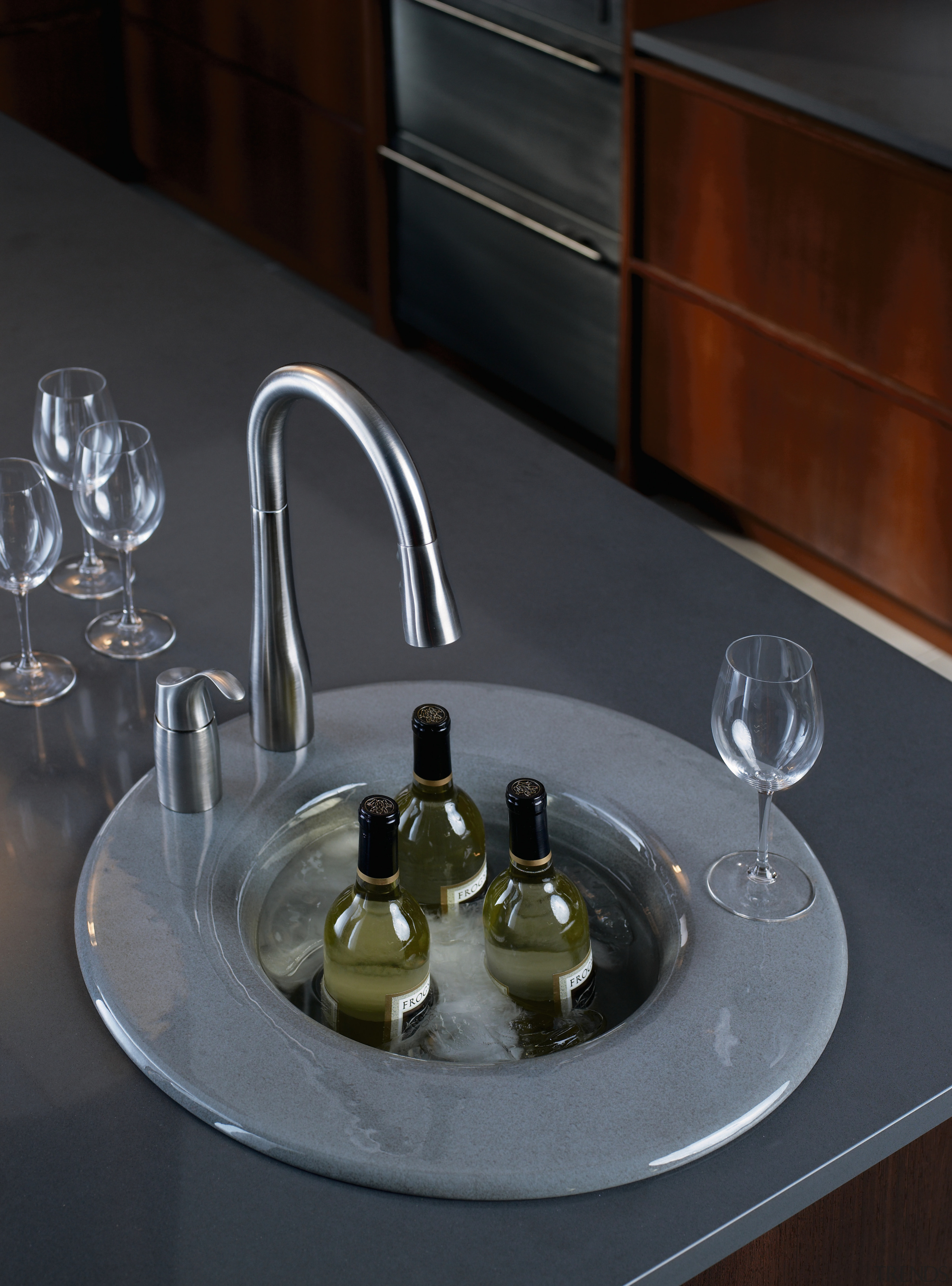 Image of Kohlers's Cordial entertainment sink which is glass, plumbing fixture, product design, sink, table, tableware, tap, black