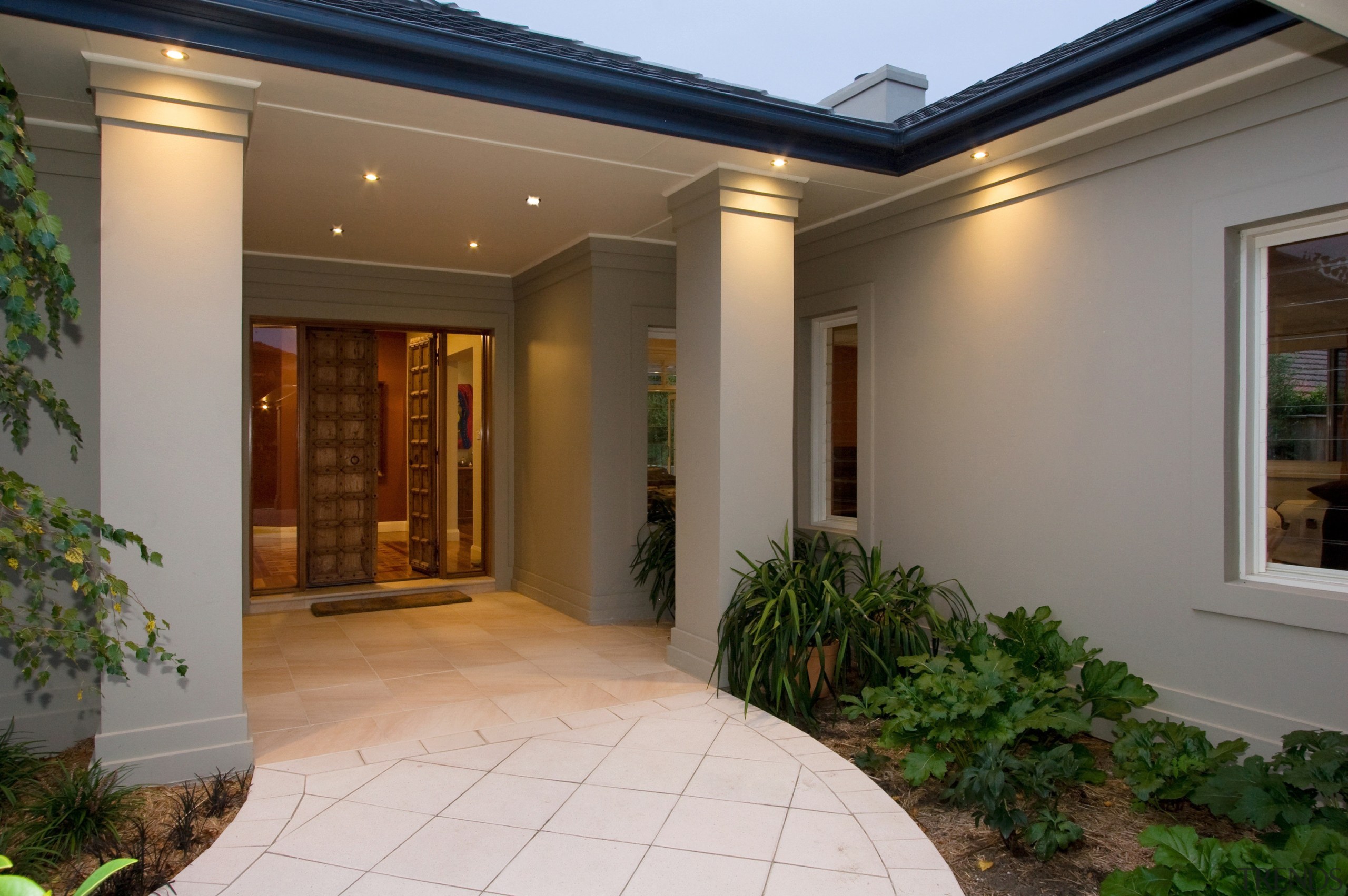 view of the entrance way of a house courtyard, door, estate, facade, home, house, interior design, lighting, lobby, property, real estate, window, brown, gray