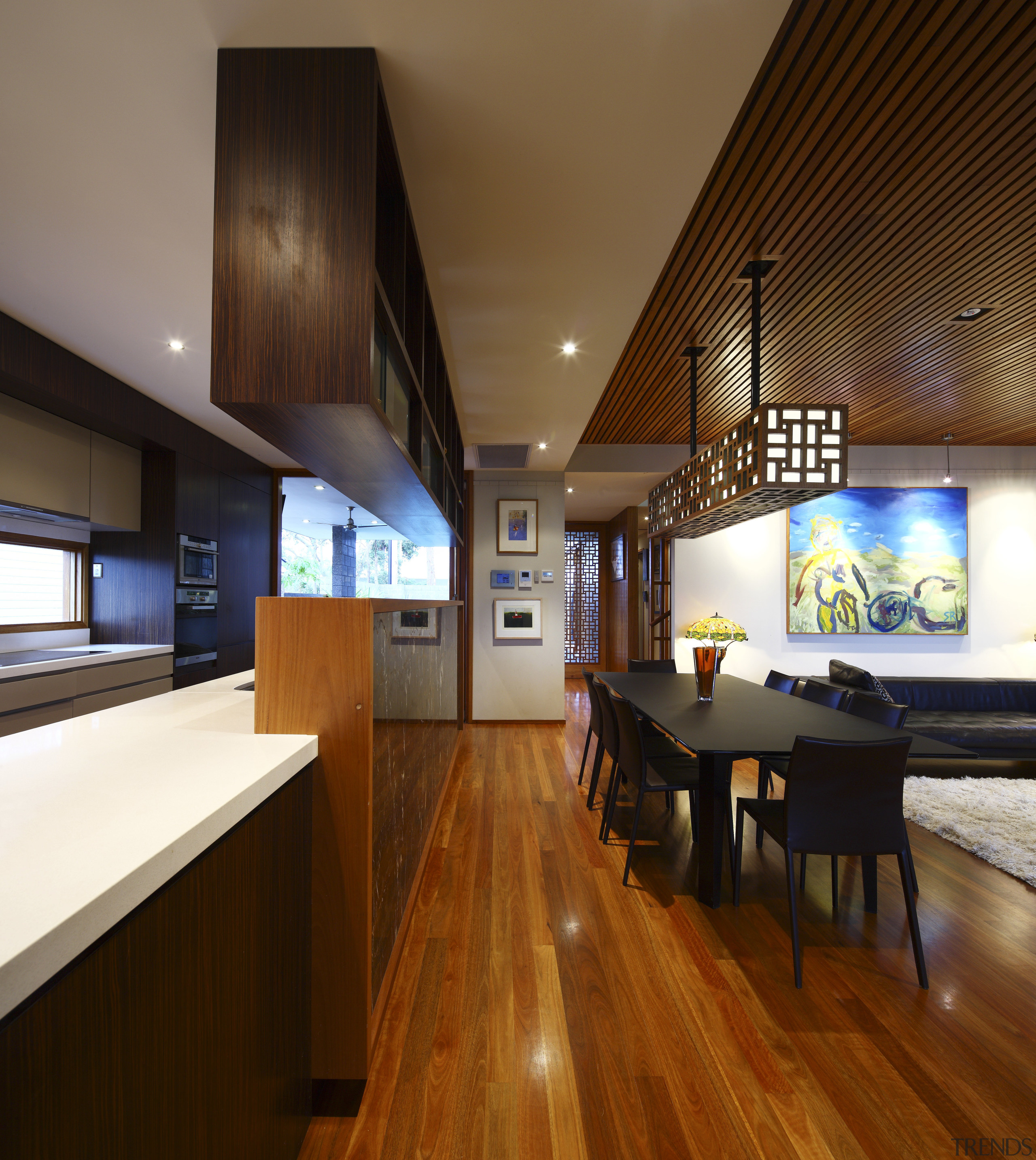 View of kitchen with wooden flooring, dark toned ceiling, flooring, interior design, real estate, wood, brown