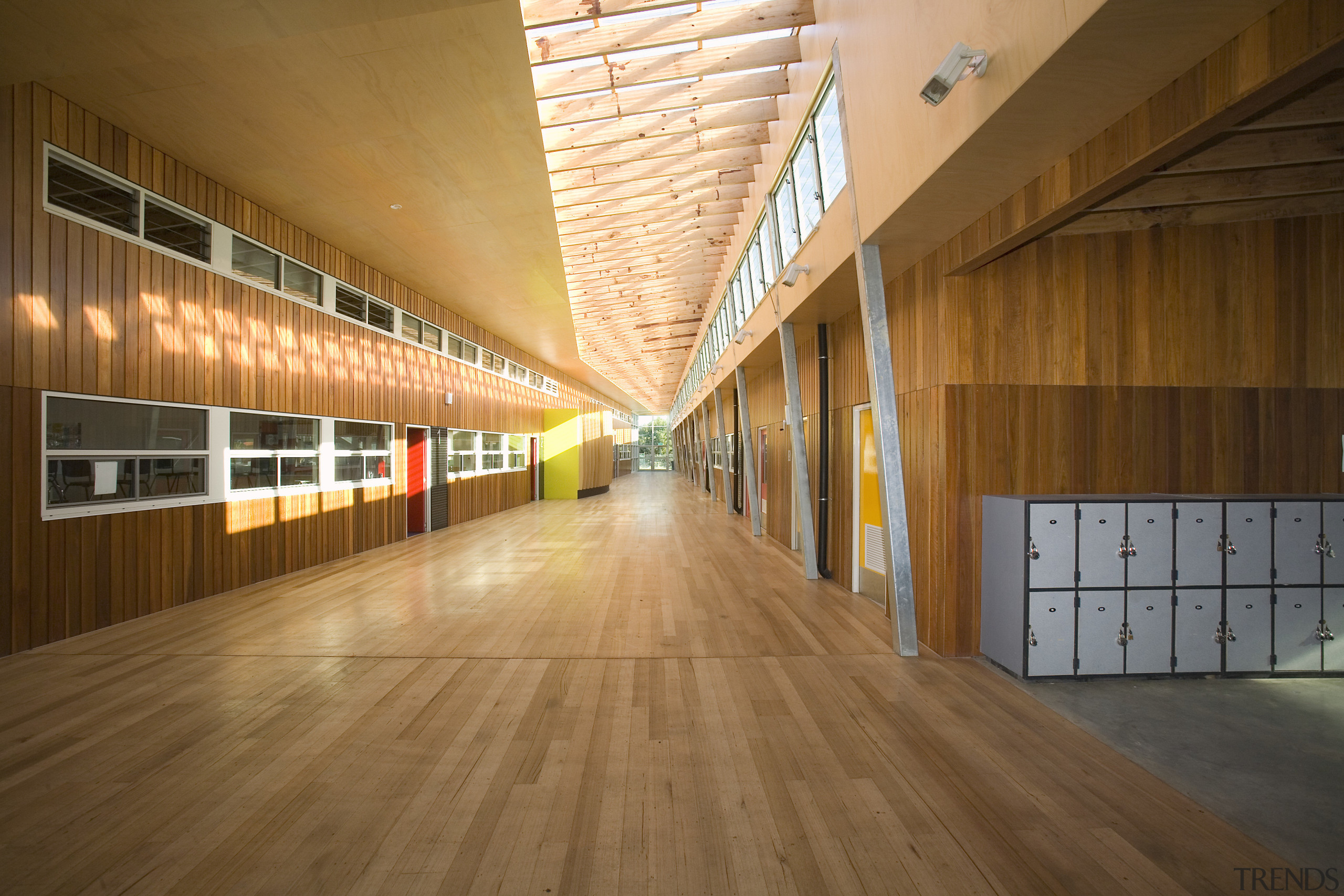 View of Williamstown High School in Melbourne. Designed architecture, ceiling, daylighting, floor, flooring, hardwood, interior design, laminate flooring, lobby, structure, wood, wood flooring, brown
