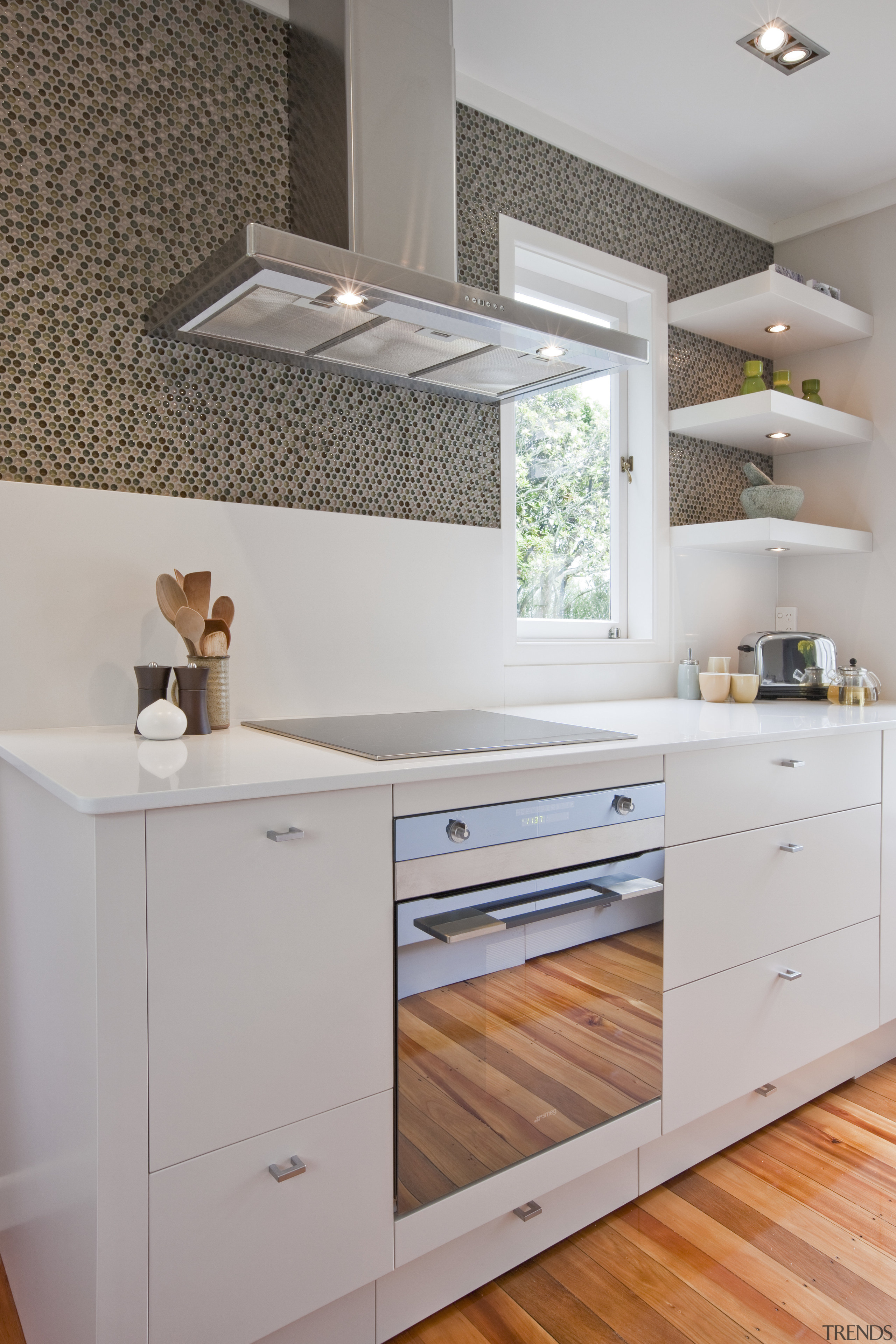 View of kitchen with retro feel and bedroom cabinetry, countertop, cuisine classique, floor, furniture, home appliance, interior design, kitchen, kitchen stove, major appliance, product, room, gray