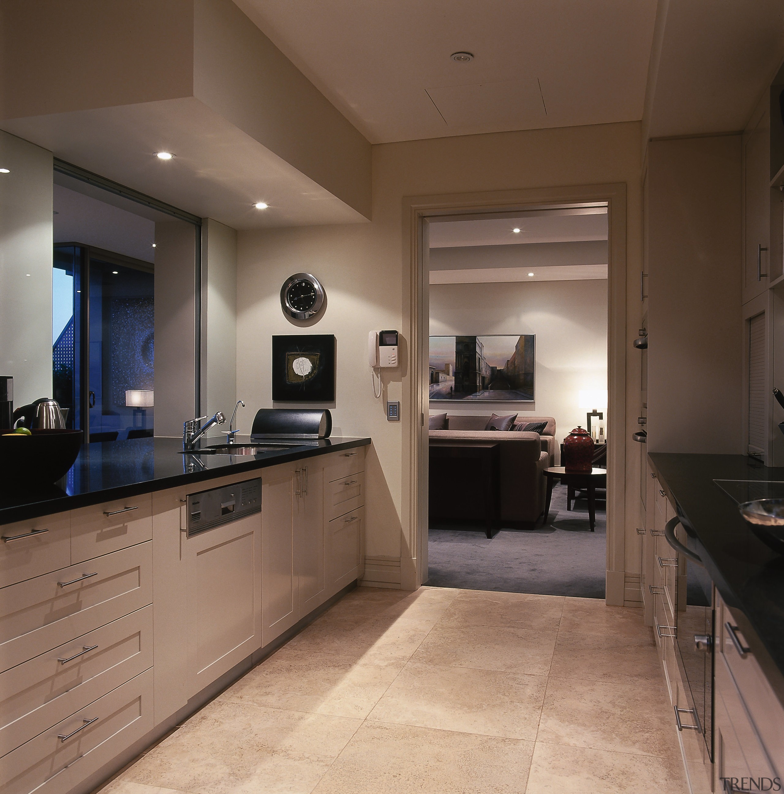 A view of  the kitchen area that cabinetry, countertop, cuisine classique, floor, flooring, interior design, kitchen, real estate, room, brown, black