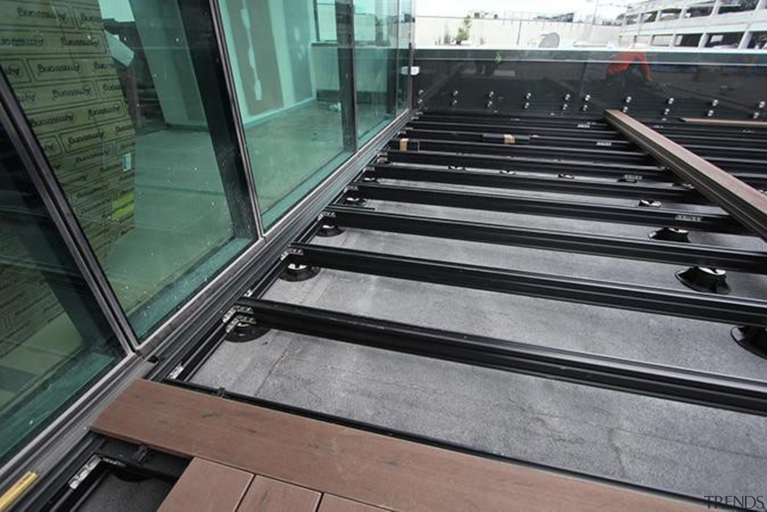 This large beautiful staff decking facility was build architecture, daylighting, floor, glass, line, metal, steel, wood, black, gray