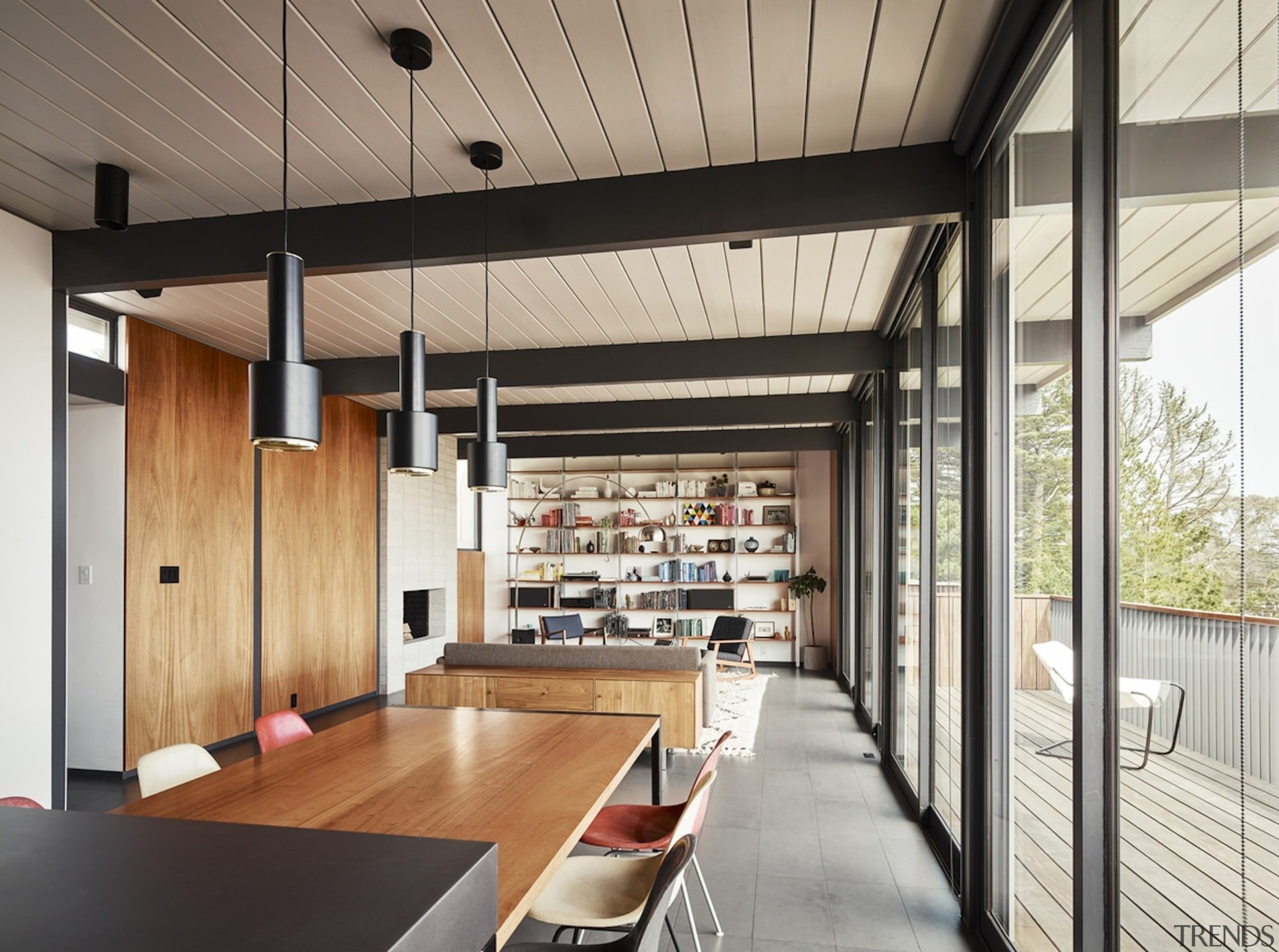 Pendant lights run along the dining table - ceiling, interior design, gray