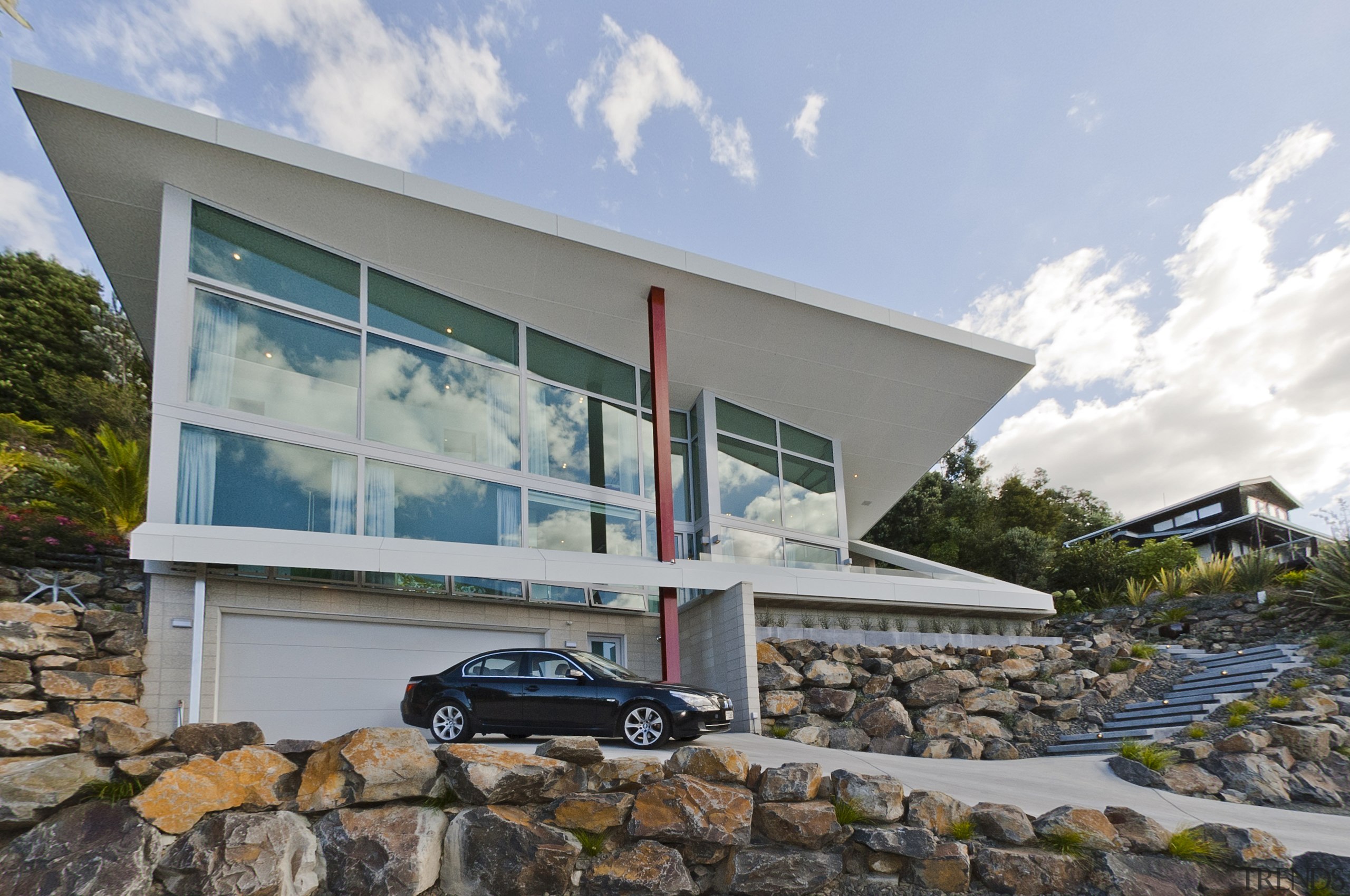 This new home has full-height glazing, with joinery architecture, building, facade, home, house, property, real estate, window, gray