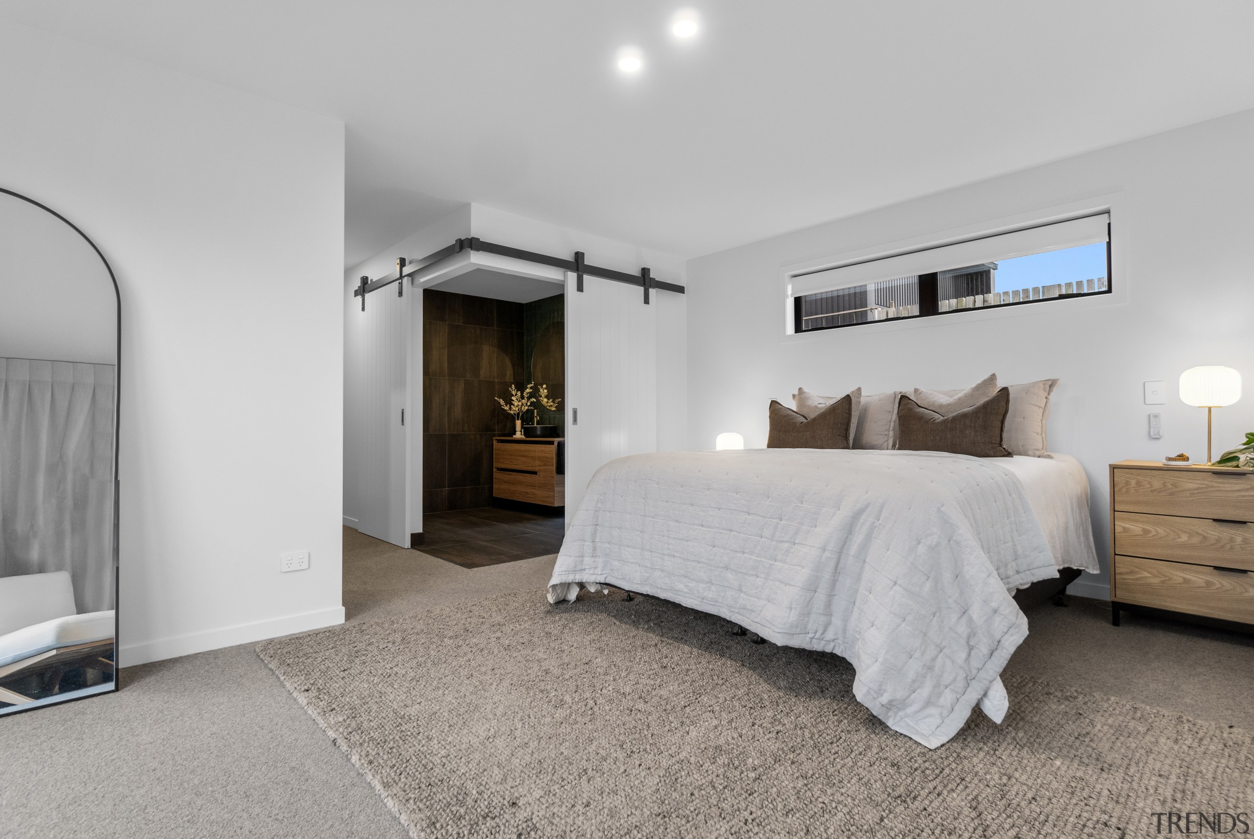 Master bedroom with master ensuite beyond separated by 