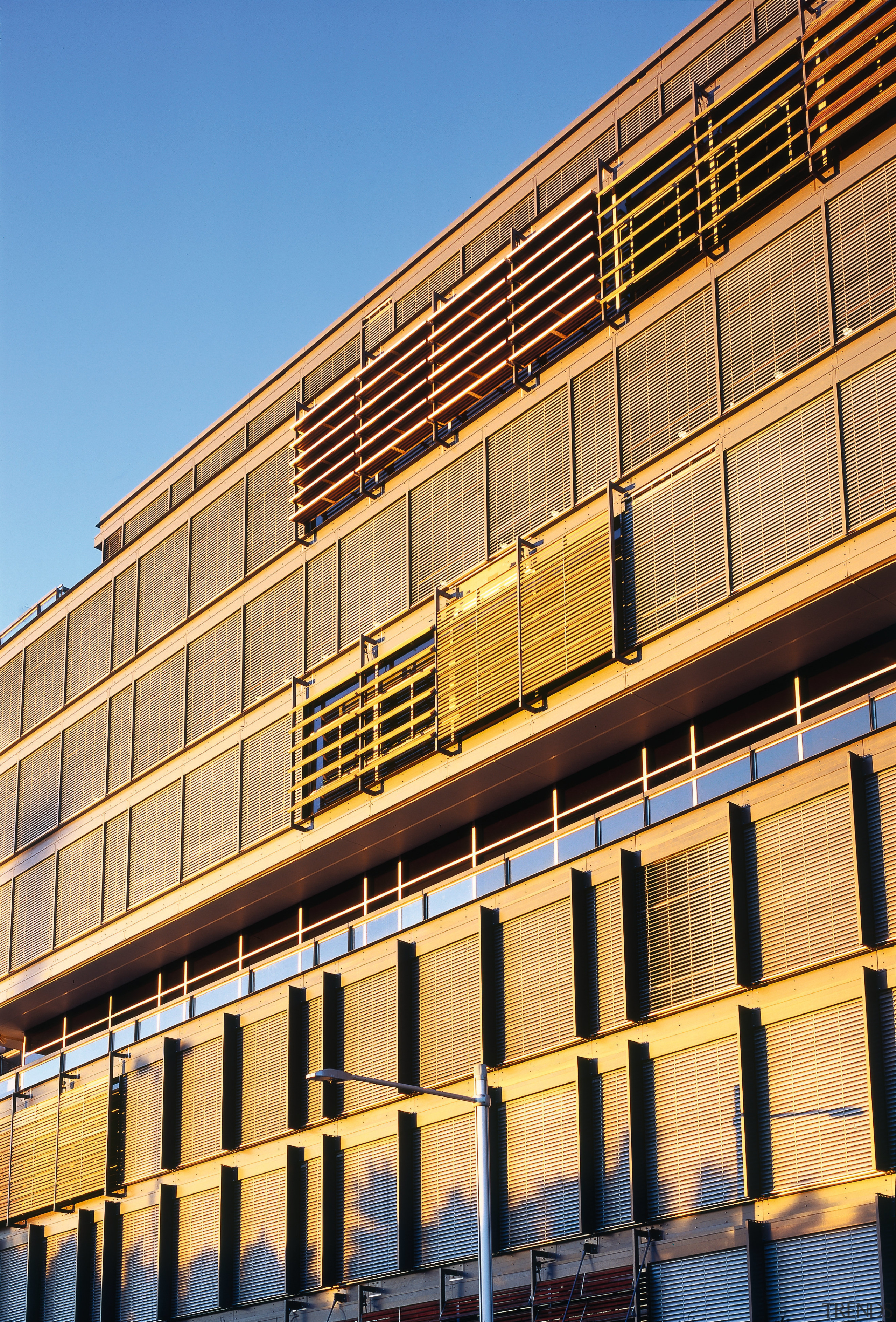 view of the building with nysan horiso operable apartment, architecture, building, commercial building, condominium, corporate headquarters, facade, headquarters, line, metropolis, metropolitan area, mixed use, residential area, sky, structure, urban area, window, orange