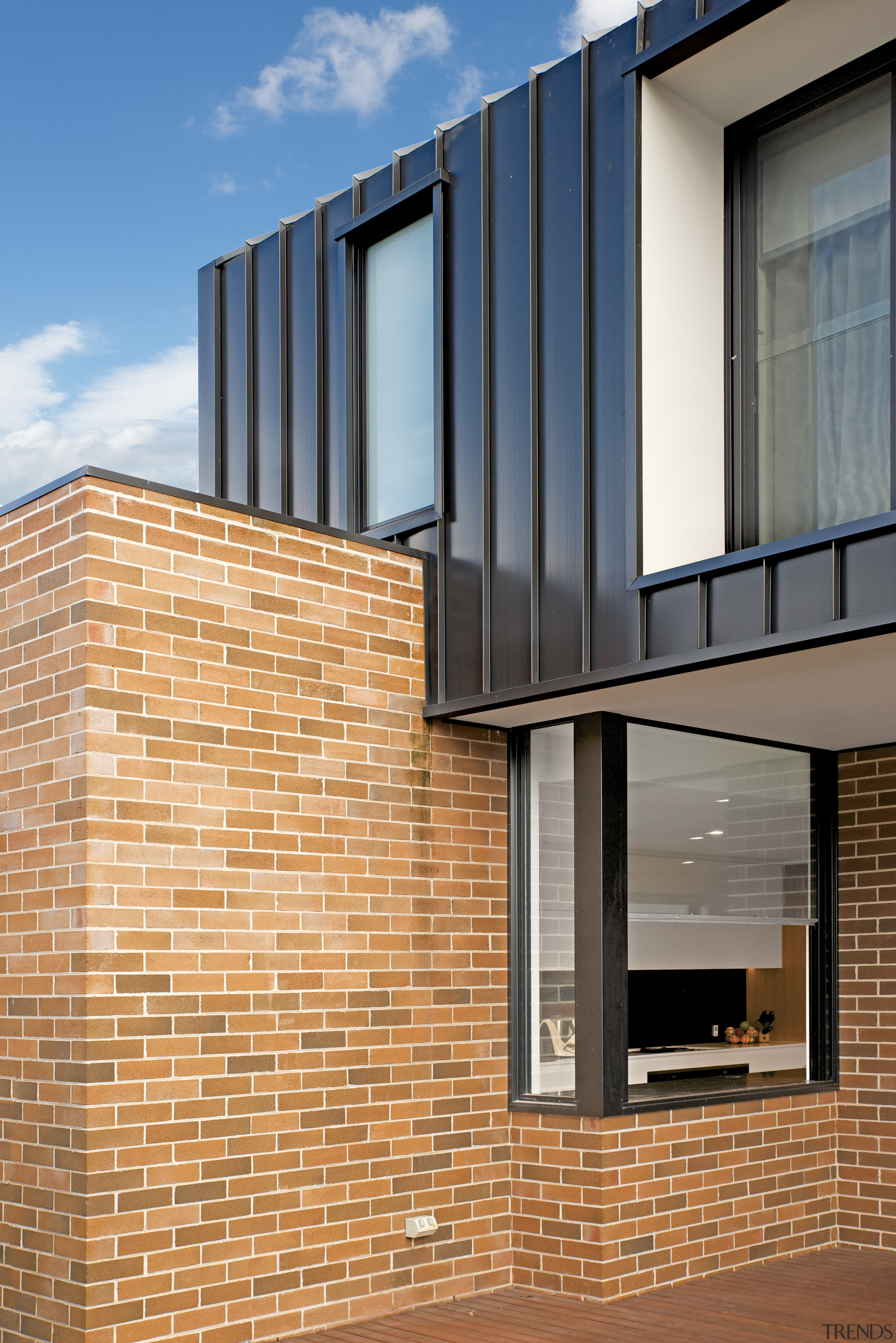 Existing bricks running one way, standing seam metal apartment, architecture, blue, brick, brickwork, building, daylighting, daytime, facade, glass, home, house, line, material property, property, real estate, residential area, siding, sky, wall, window