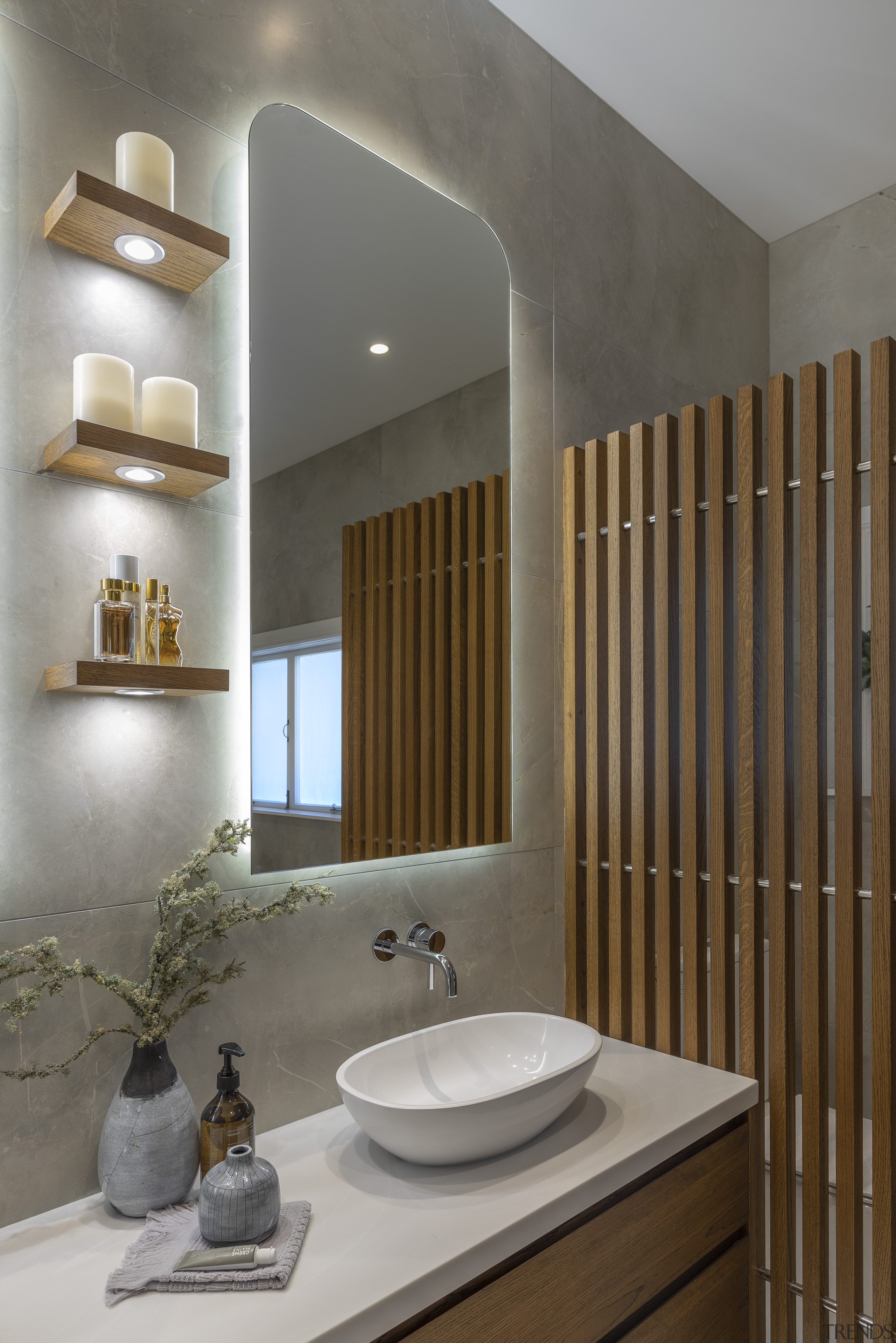 Under-lit wood display shelves provide a design feature architecture, bathroom, bathroom accessory, bathroom cabinet, bathroom sink, beige, building, ceiling, ceramic, floor, furniture, home, house, interior design, lighting, material property, plumbing fixture, property, real estate, room, sink, tap, tile, gray