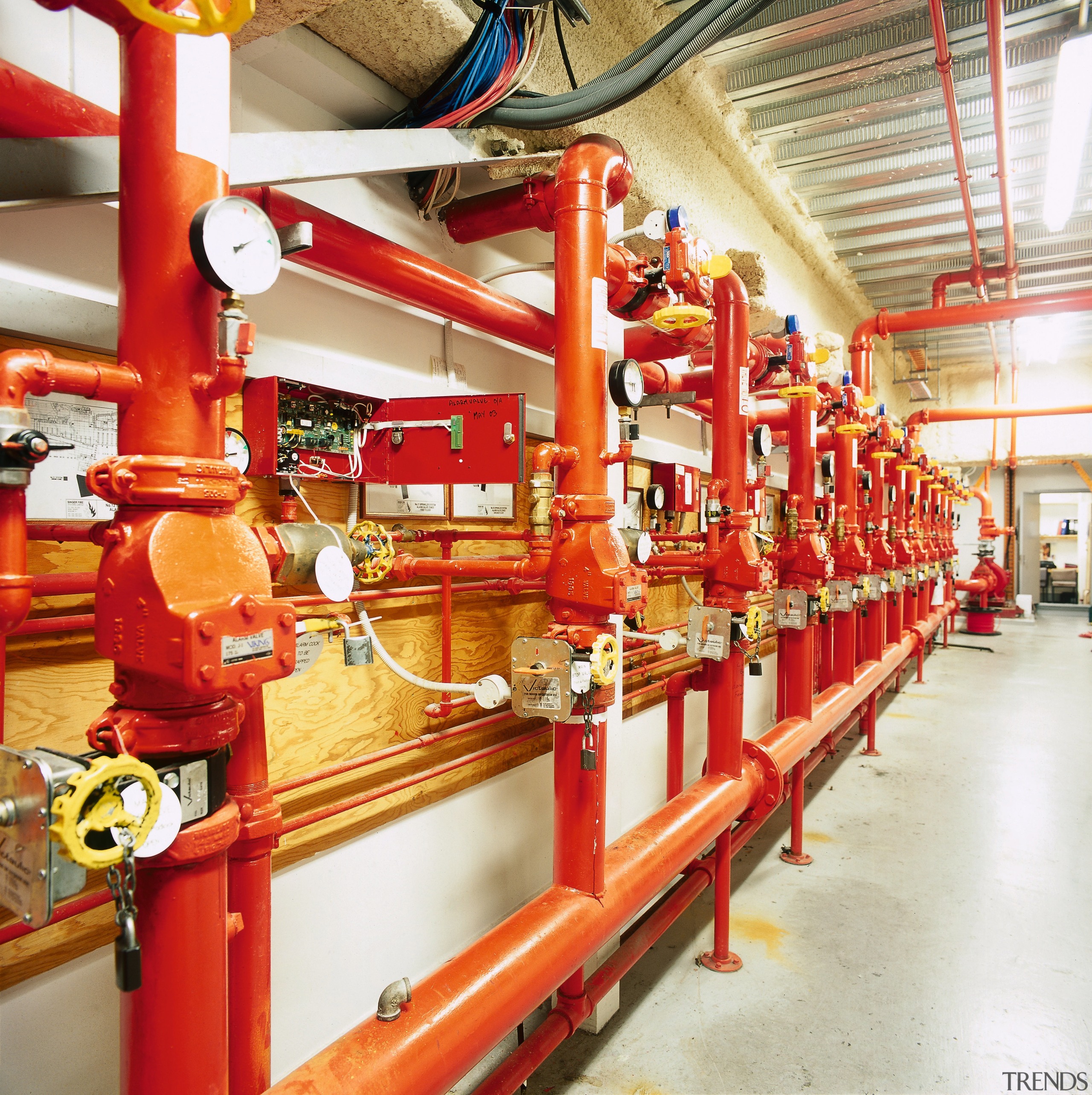 Pipework of airport sprinkler system. - Pipework of factory, manufacturing, product, white, red