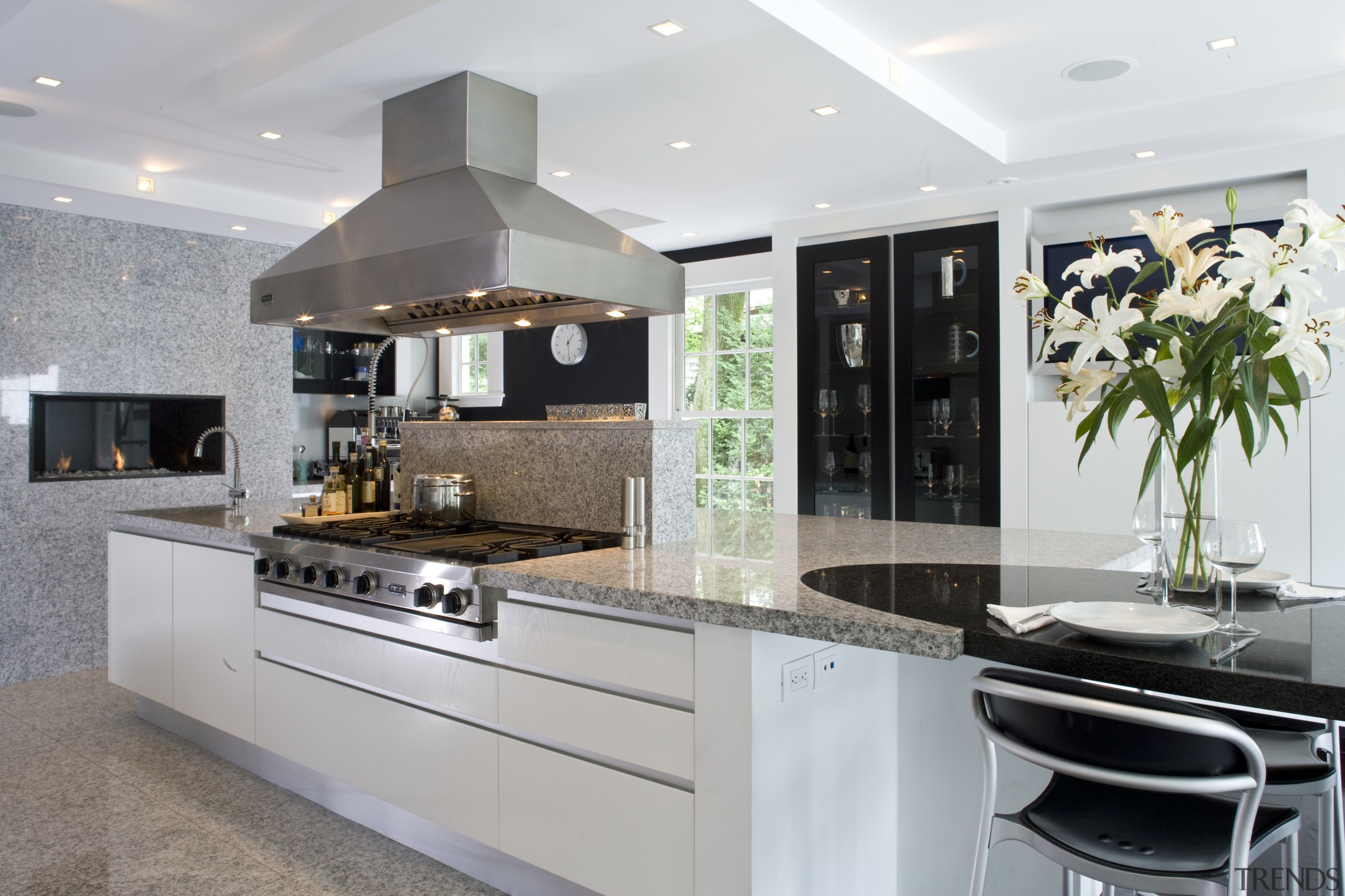 Kitchen has Granite tops and contrasting dark walnut countertop, cuisine classique, interior design, kitchen, gray