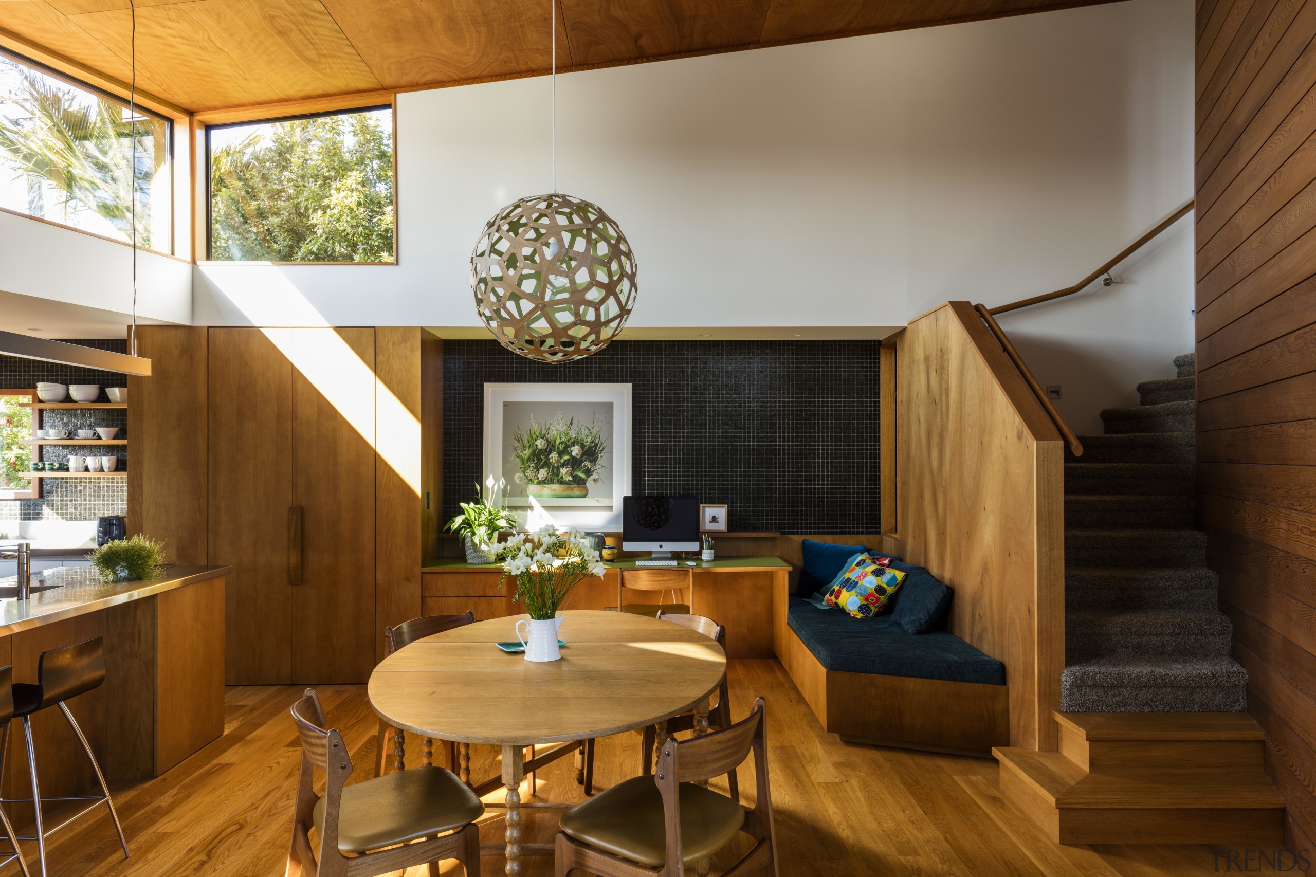 The tones of the wood pantry continue into architecture, ceiling, dining room, home, house, interior design, living room, real estate, room, wood, brown