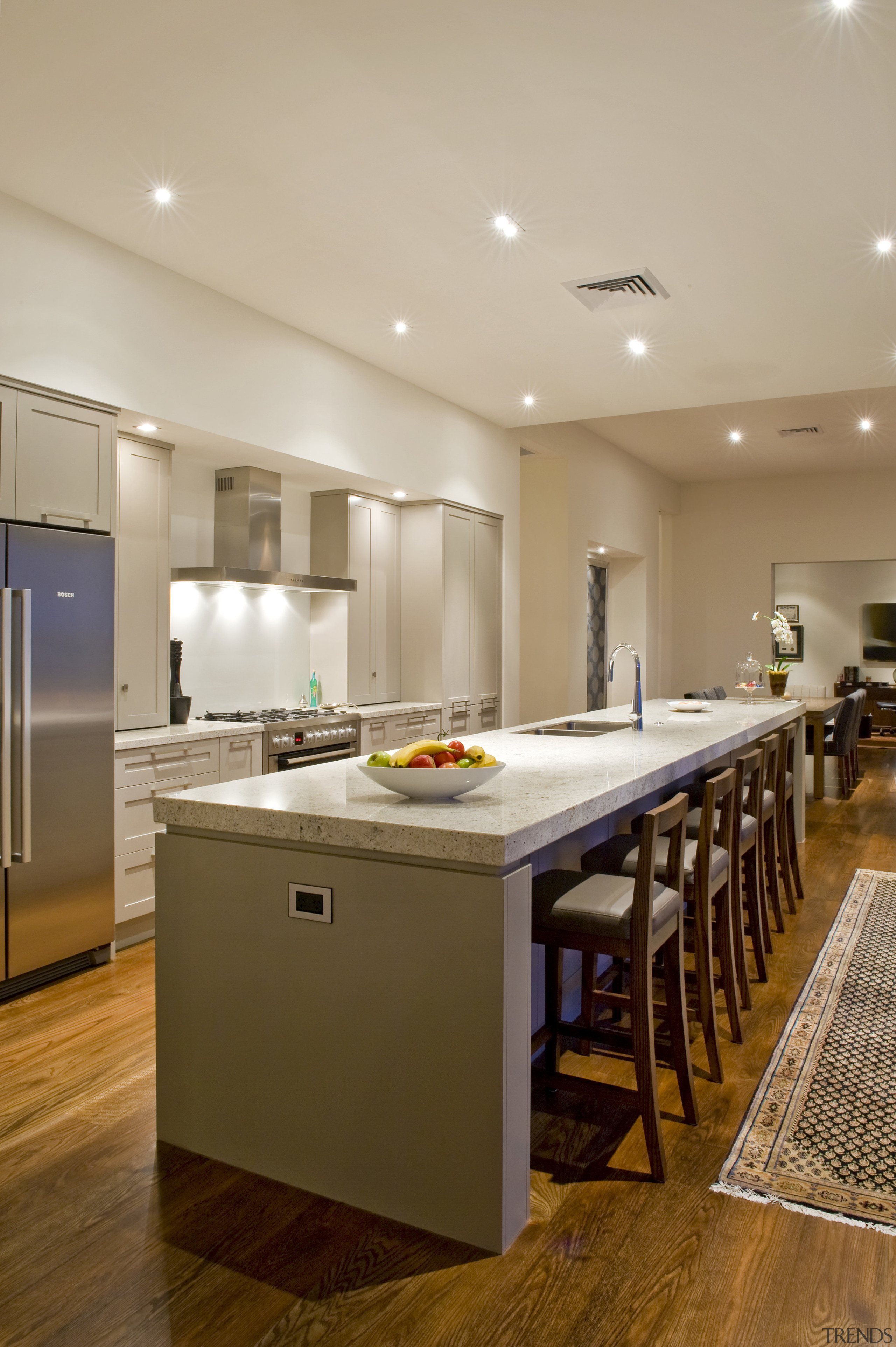 View of the kitchen of this house built cabinetry, ceiling, countertop, floor, flooring, hardwood, interior design, kitchen, laminate flooring, real estate, room, wood flooring, orange, brown