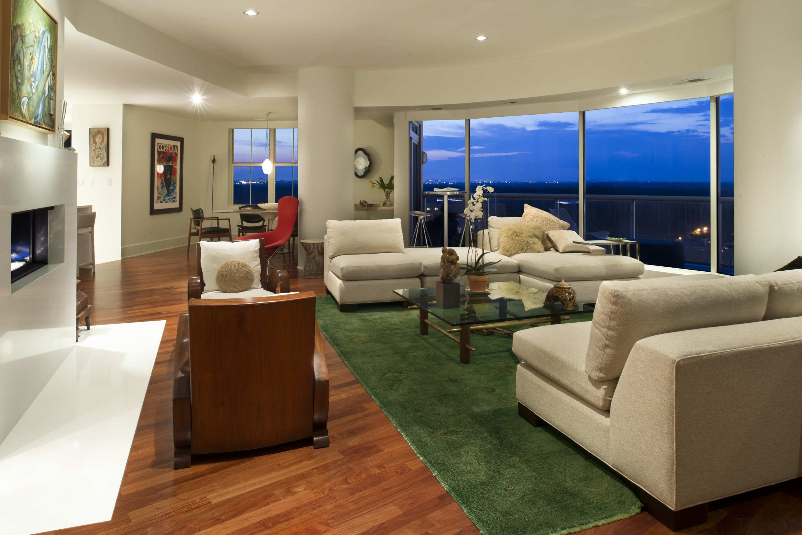 Furniture and art in a mix of colors, floor, interior design, living room, property, real estate, room, brown, orange