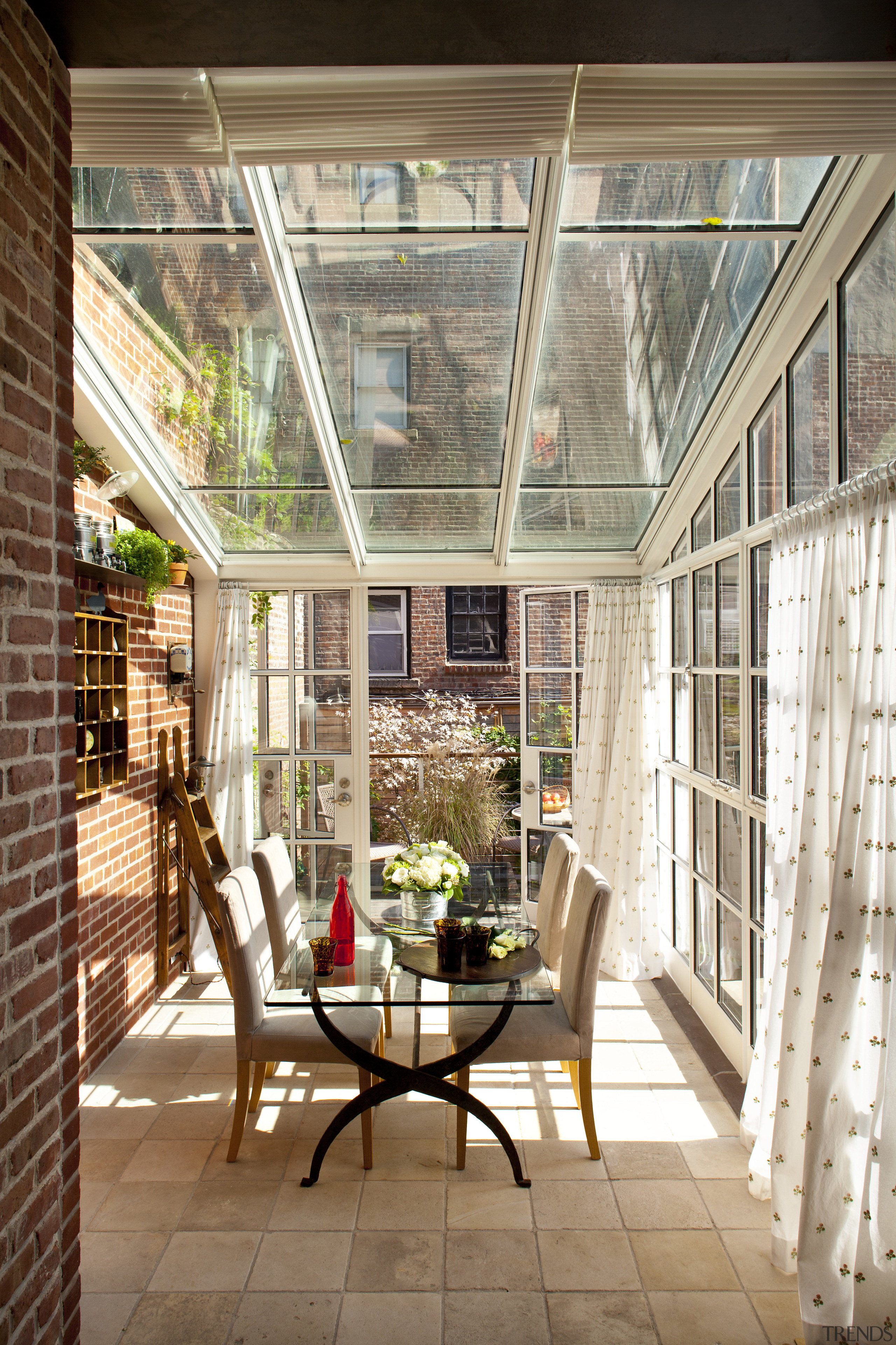 This kitchen in a Federal-style townhouse opens to daylighting, home, house, interior design, orangery, outdoor structure, patio, porch, roof, window, brown, white