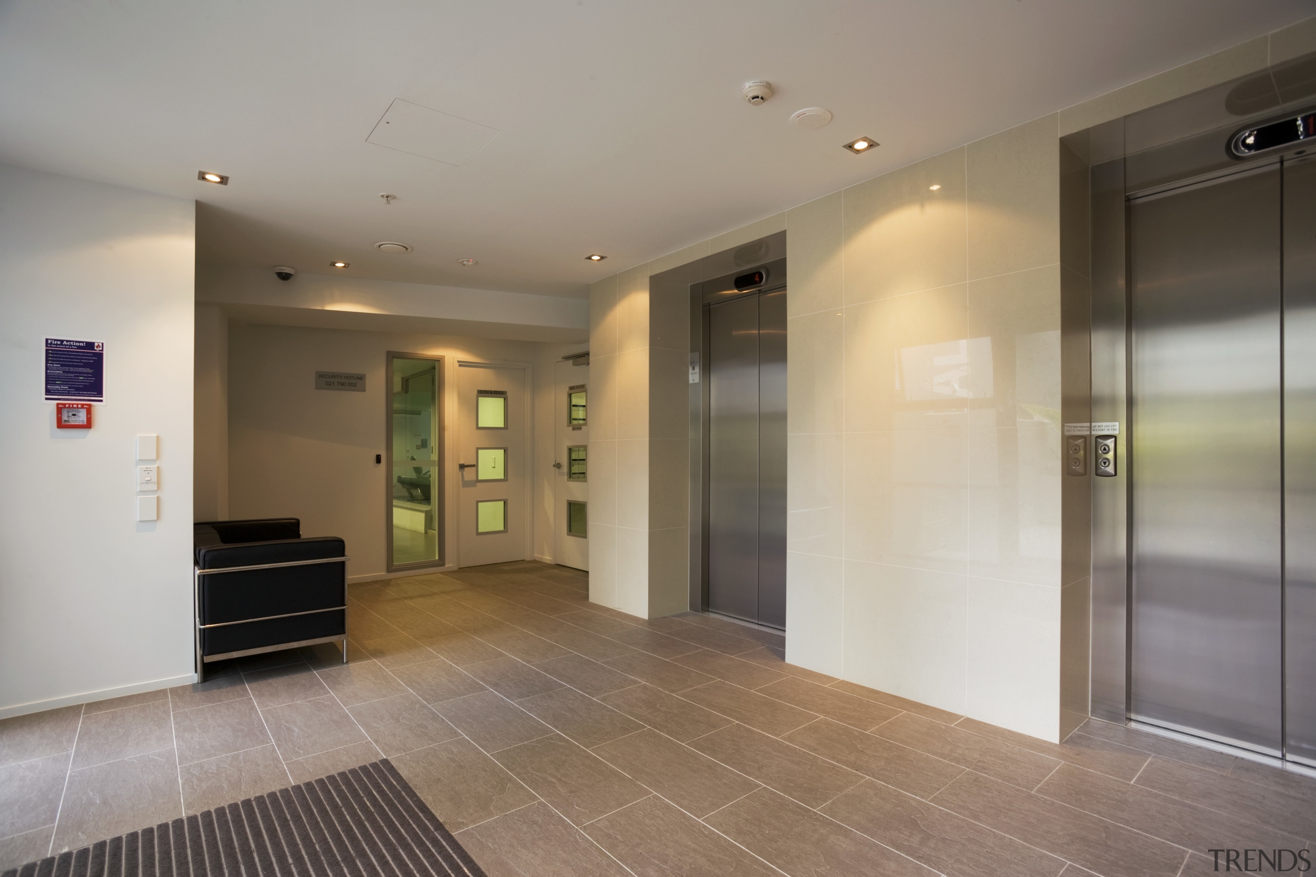 View of elevators in the Federal Apartments which apartment, ceiling, door, floor, flooring, interior design, lobby, property, real estate, room, gray, brown