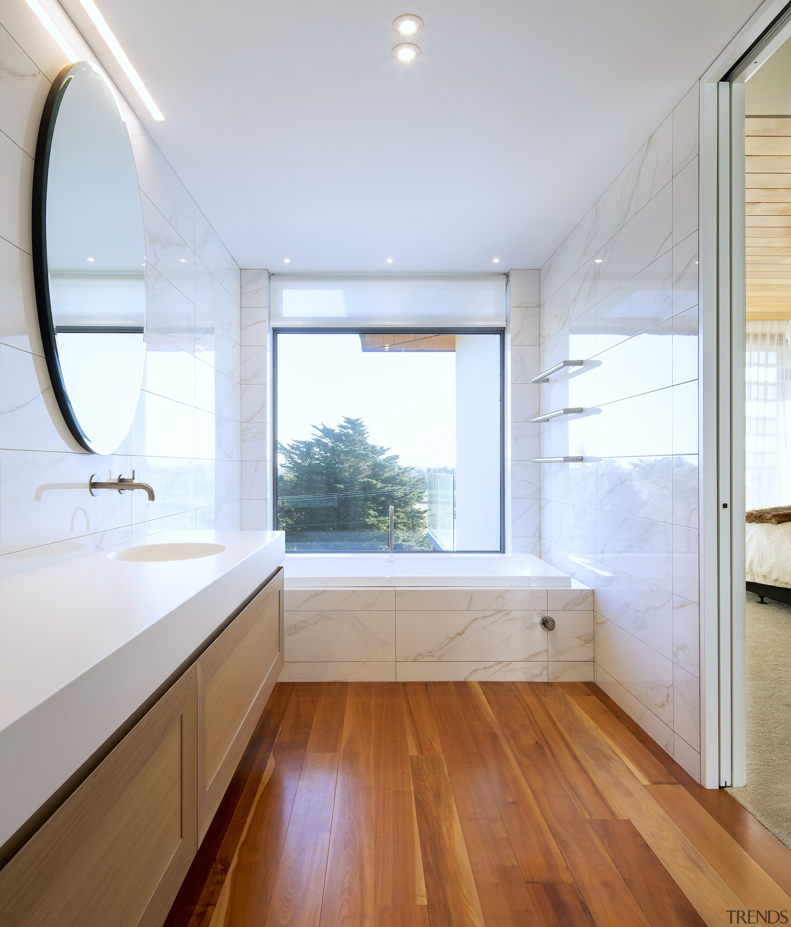 Rich matai flooring and the American oak vanity 