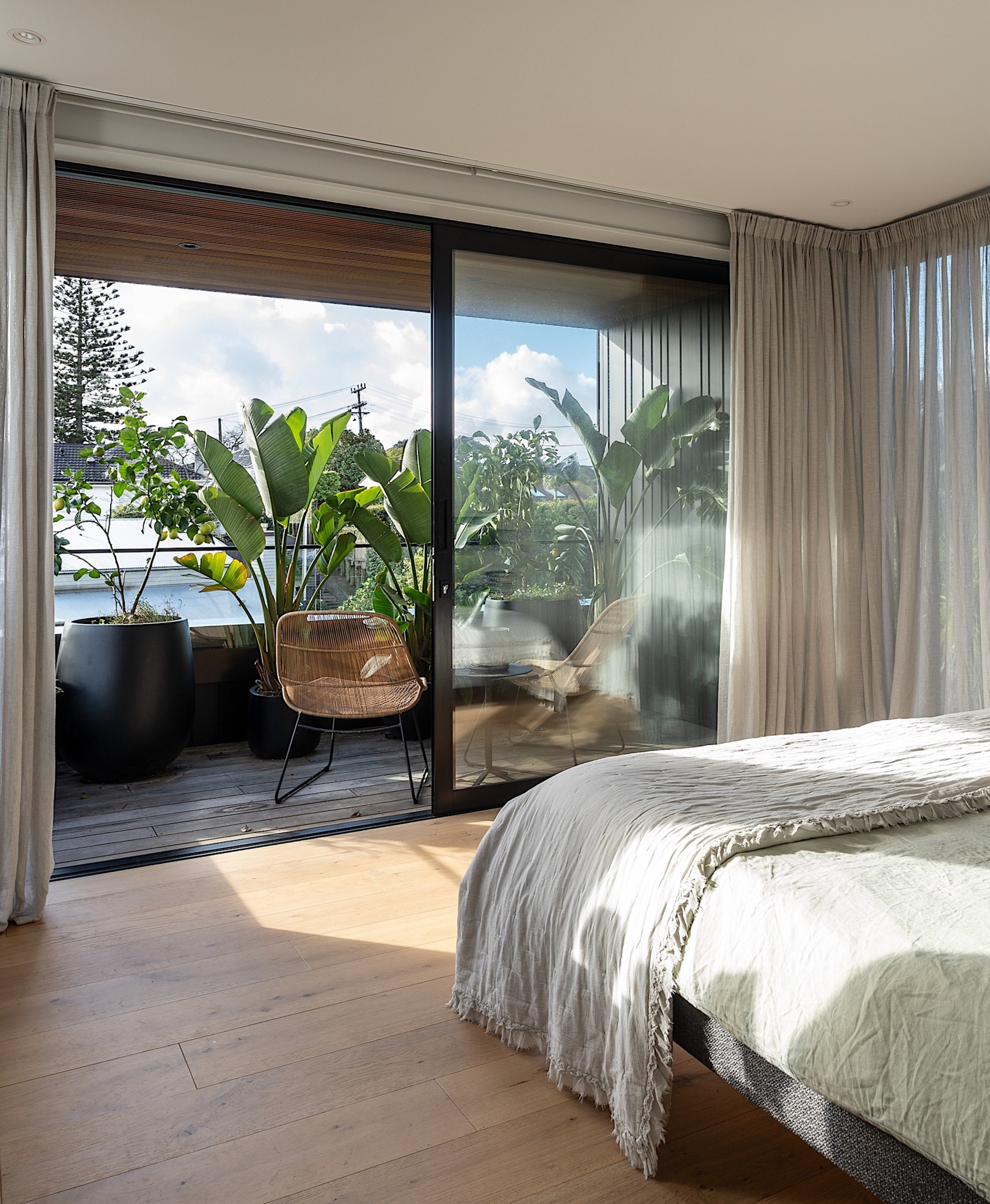 Top floor master bedroom with private balcony and 