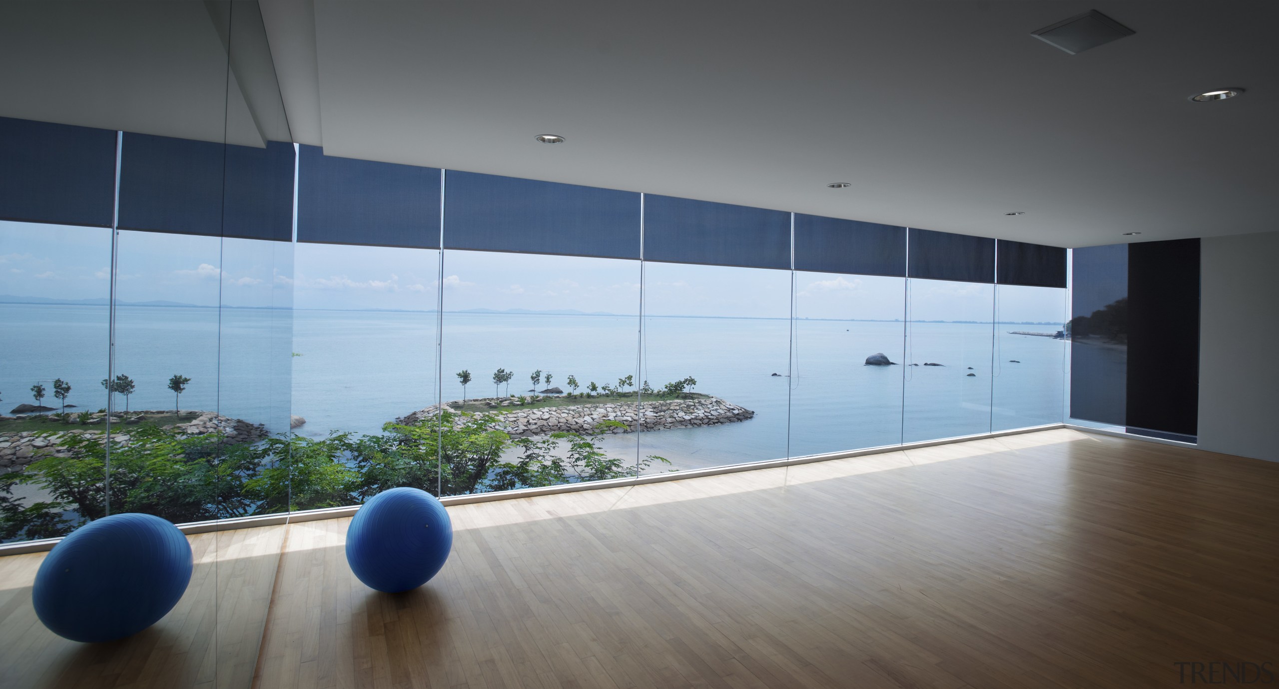 View of fitness area at the Springtide Residences architecture, ceiling, floor, flooring, glass, house, interior design, wall, gray