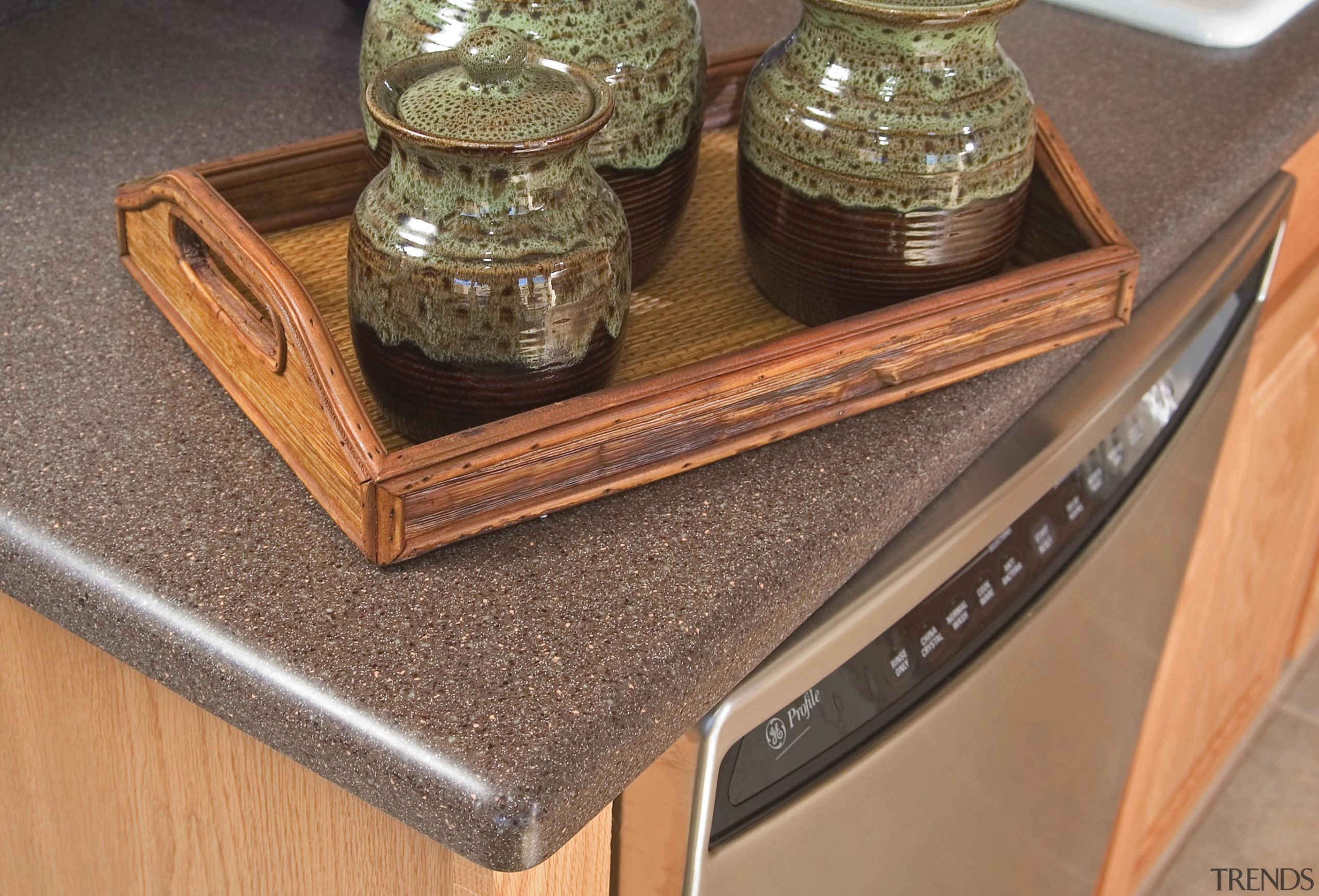 A close up view of the grey benchtop, furniture, product design, table, wood stain, brown