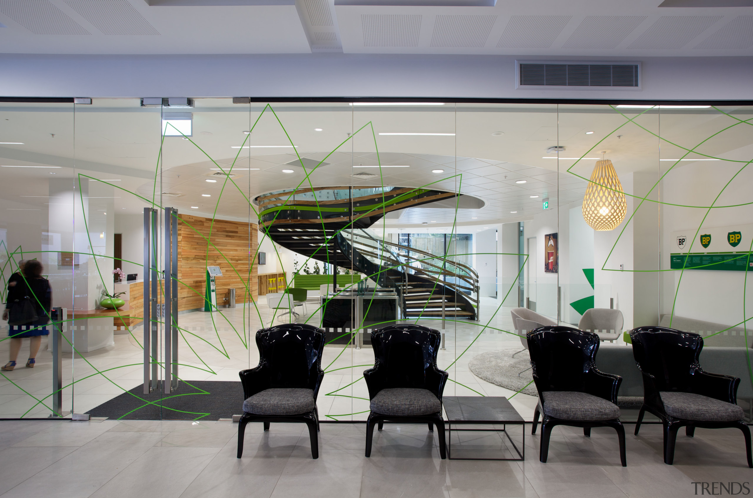 Green graphics on the glass walls of the ceiling, glass, interior design, lobby, gray