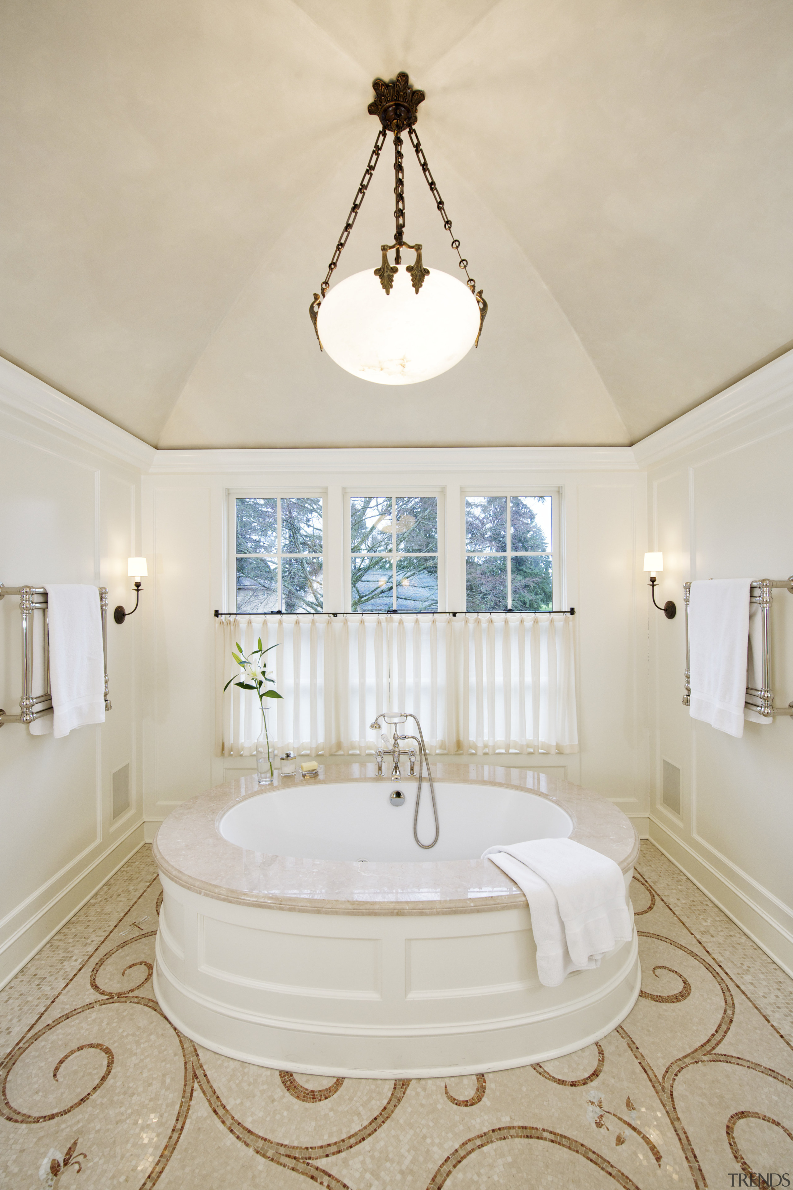 A large round tub with a marble surround bathroom, ceiling, estate, floor, flooring, home, interior design, product, real estate, room, sink, gray