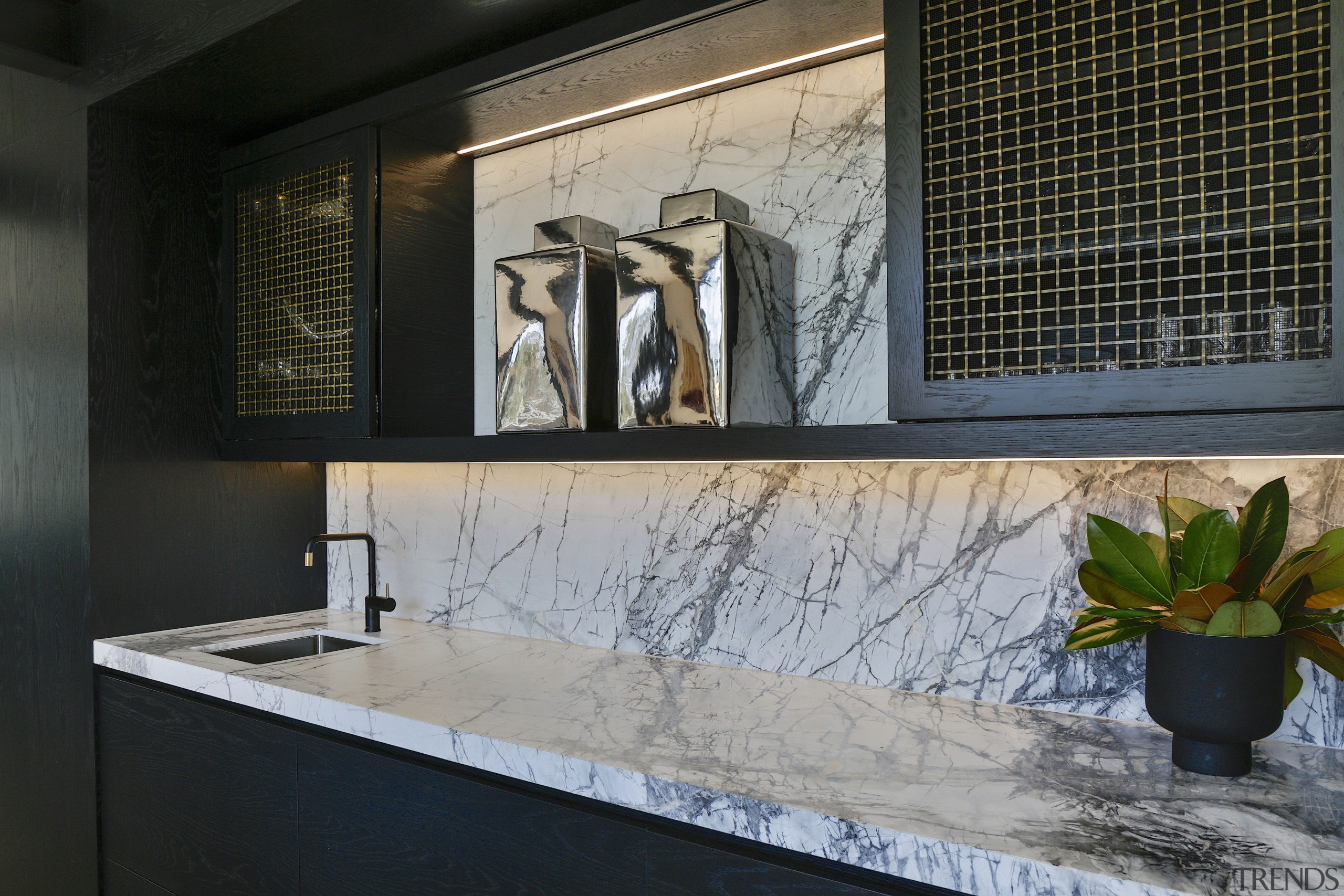 Even the rear marble benchtop and marble splashback 